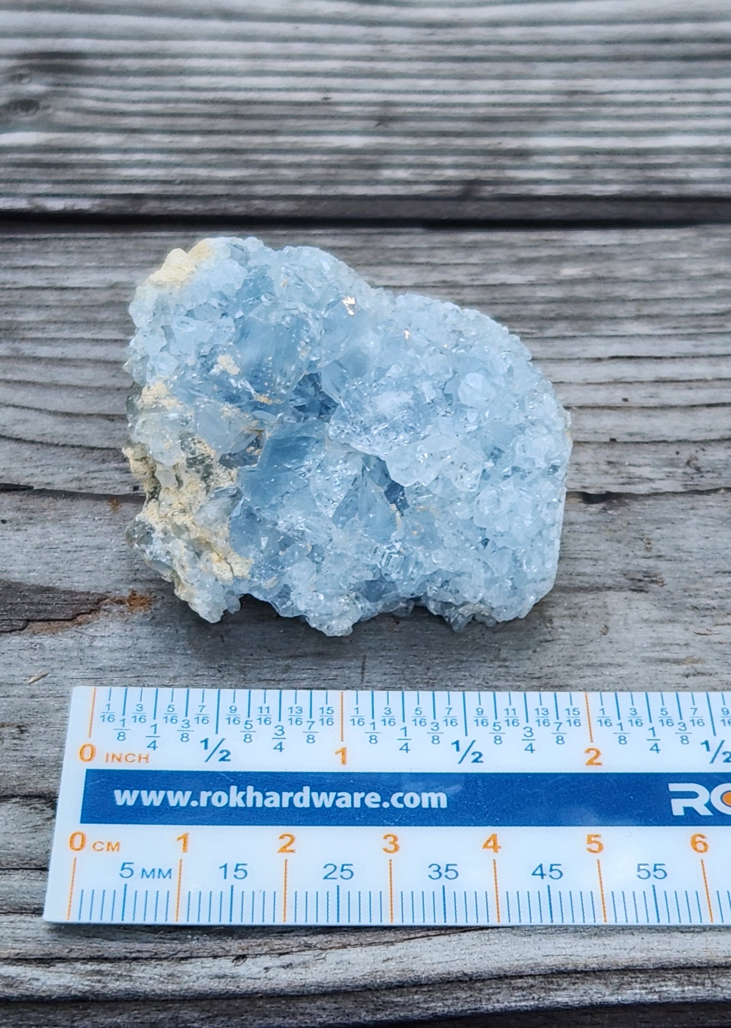 Natural Celestite crystal cluster with ruler for size, item RC431