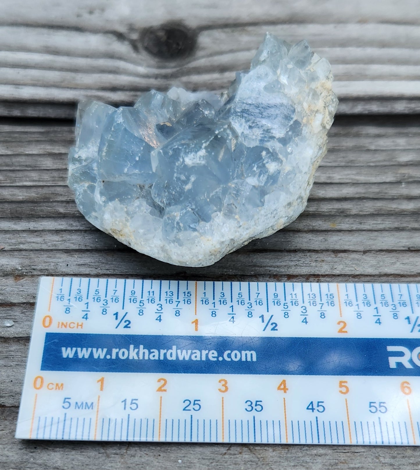 Natural Celestite crystal cluster with ruler for size, item RC432