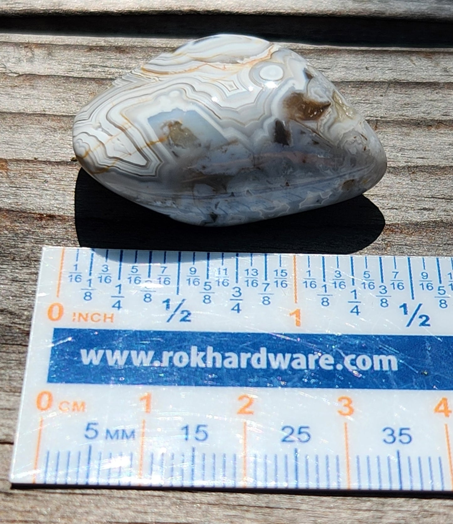 Mexican Crazy Lace Agate displayed with ruler for size reference, TA363