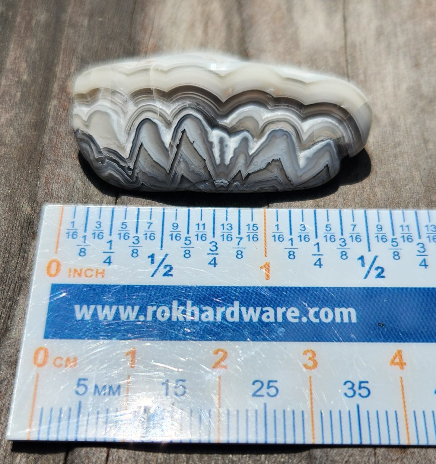 Mexican Crazy Lace Agate displayed with ruler for size reference, TA368