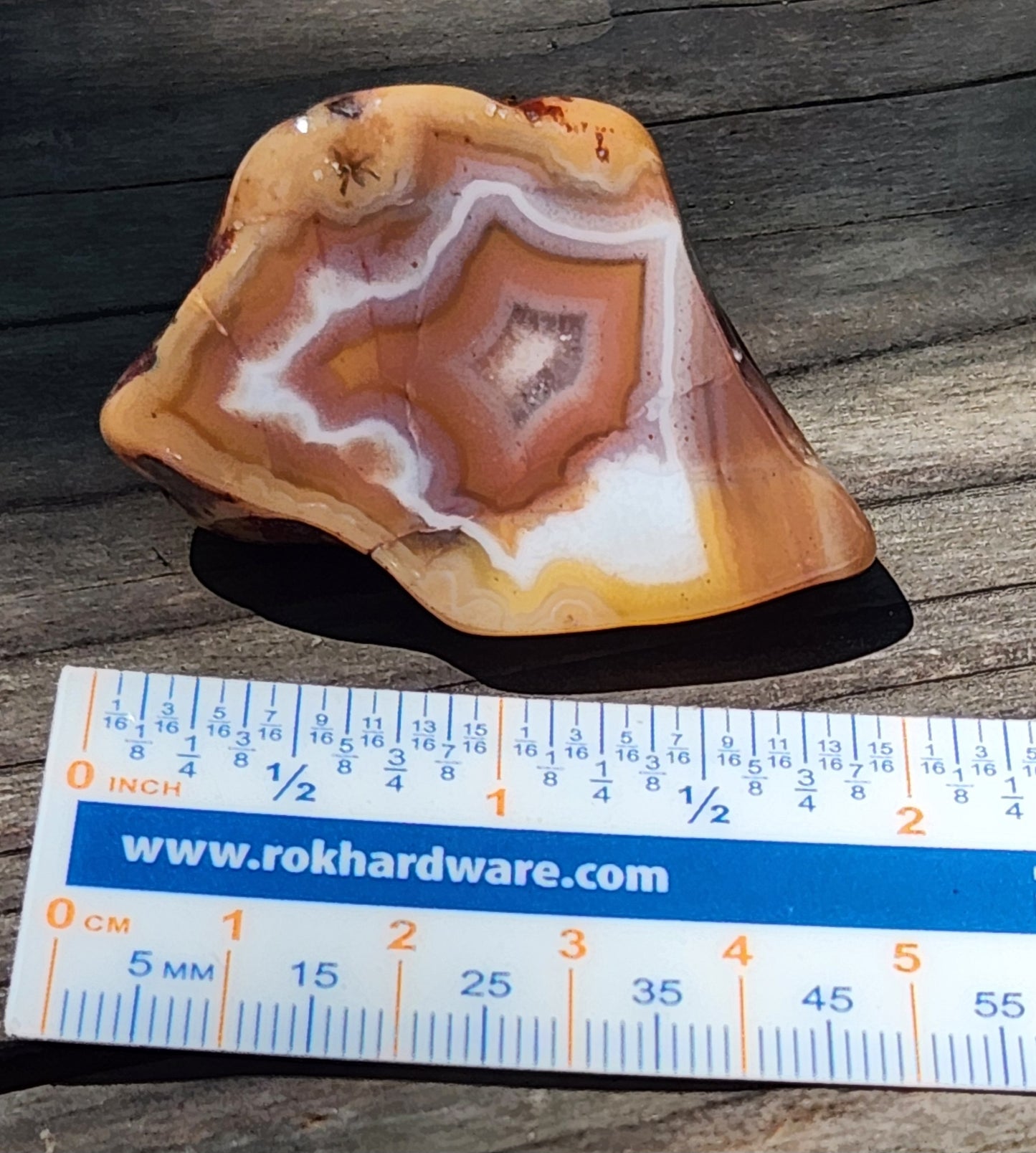 Mexican agate displayed with ruler TA331