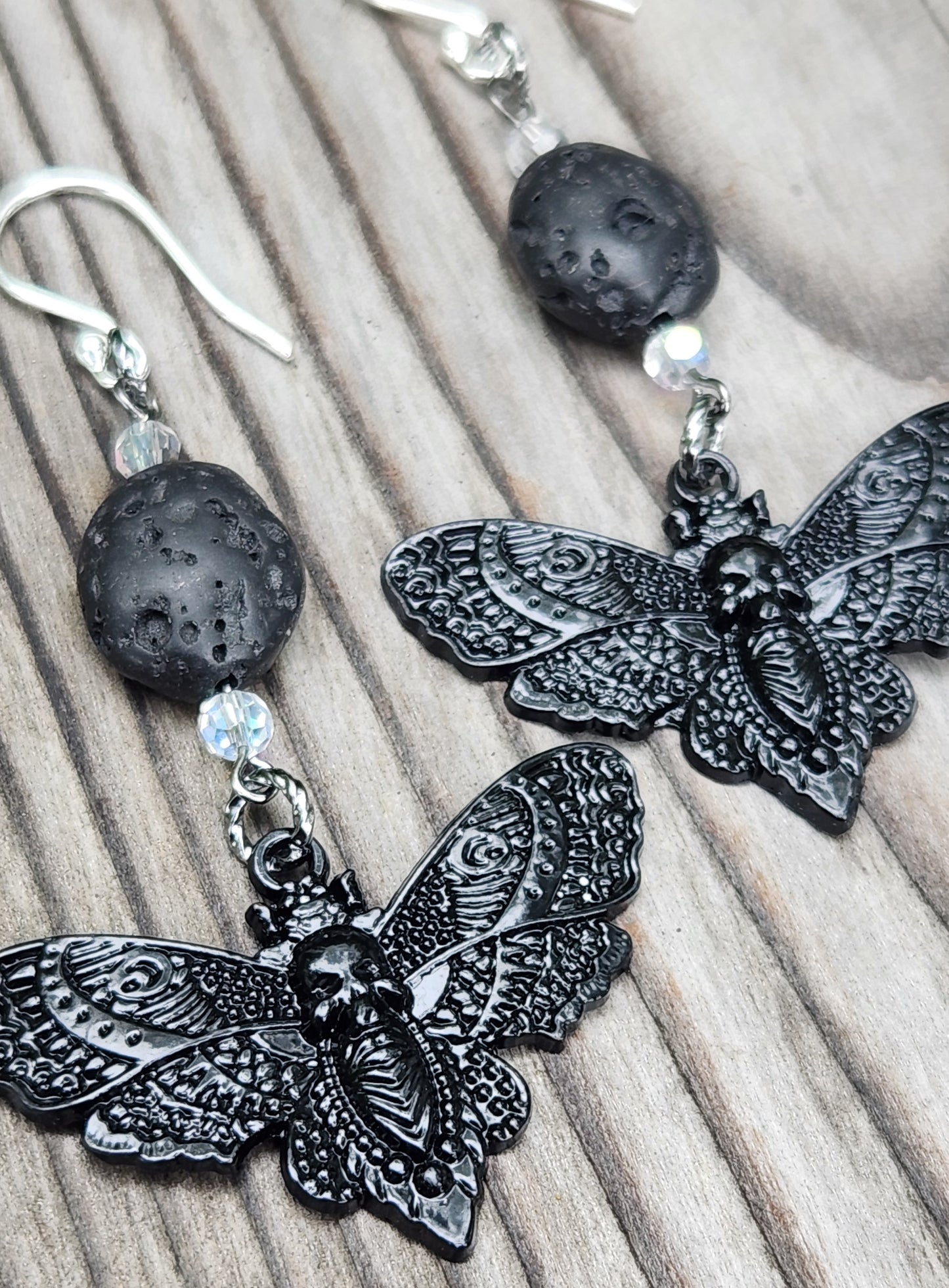 Black moth and lava bead sterling silver dangle earrings