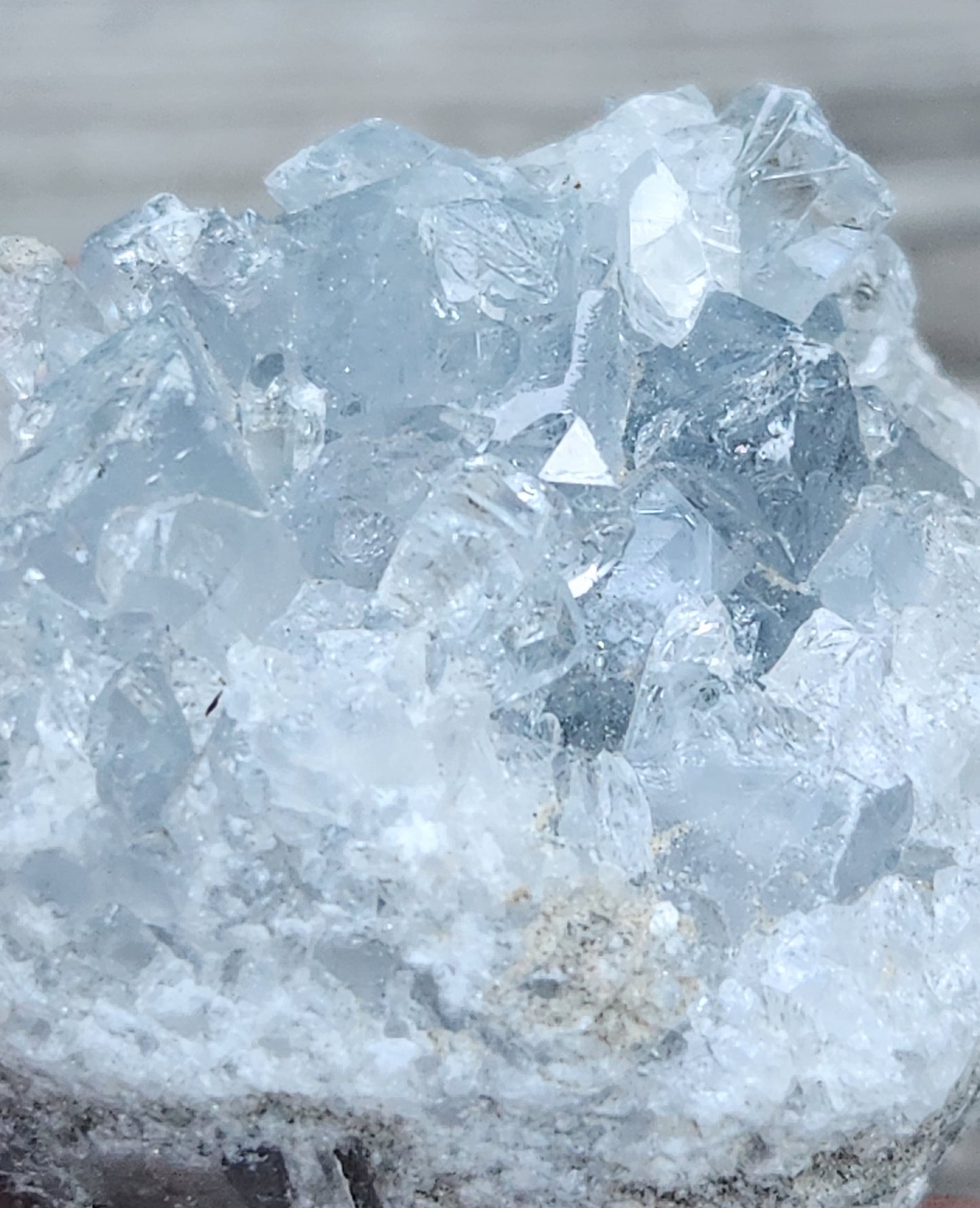Natural Celestite crystal cluster with translucent blue terminations, item RC435
