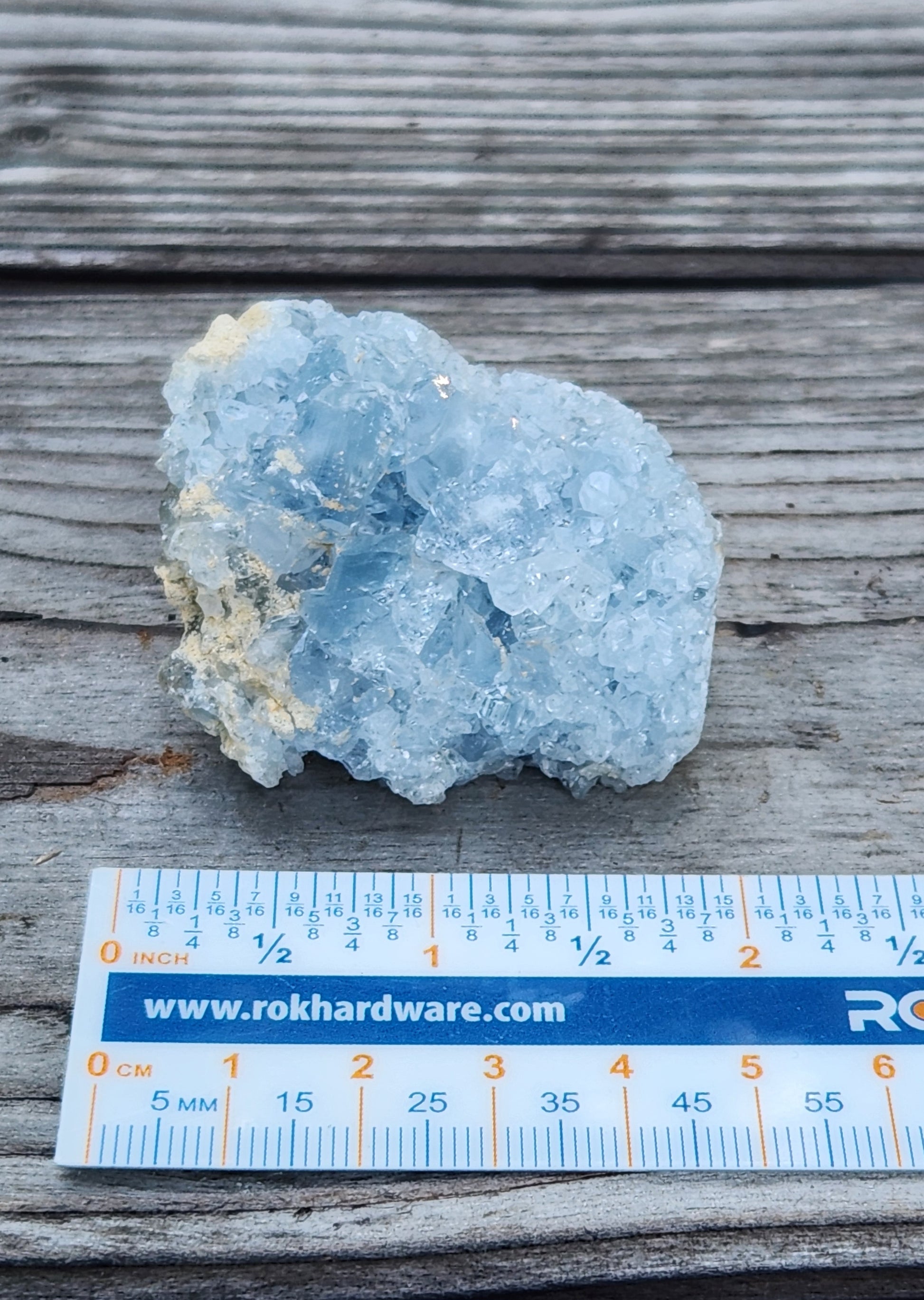 Natural Celestite crystal cluster with ruler for size, item RC431