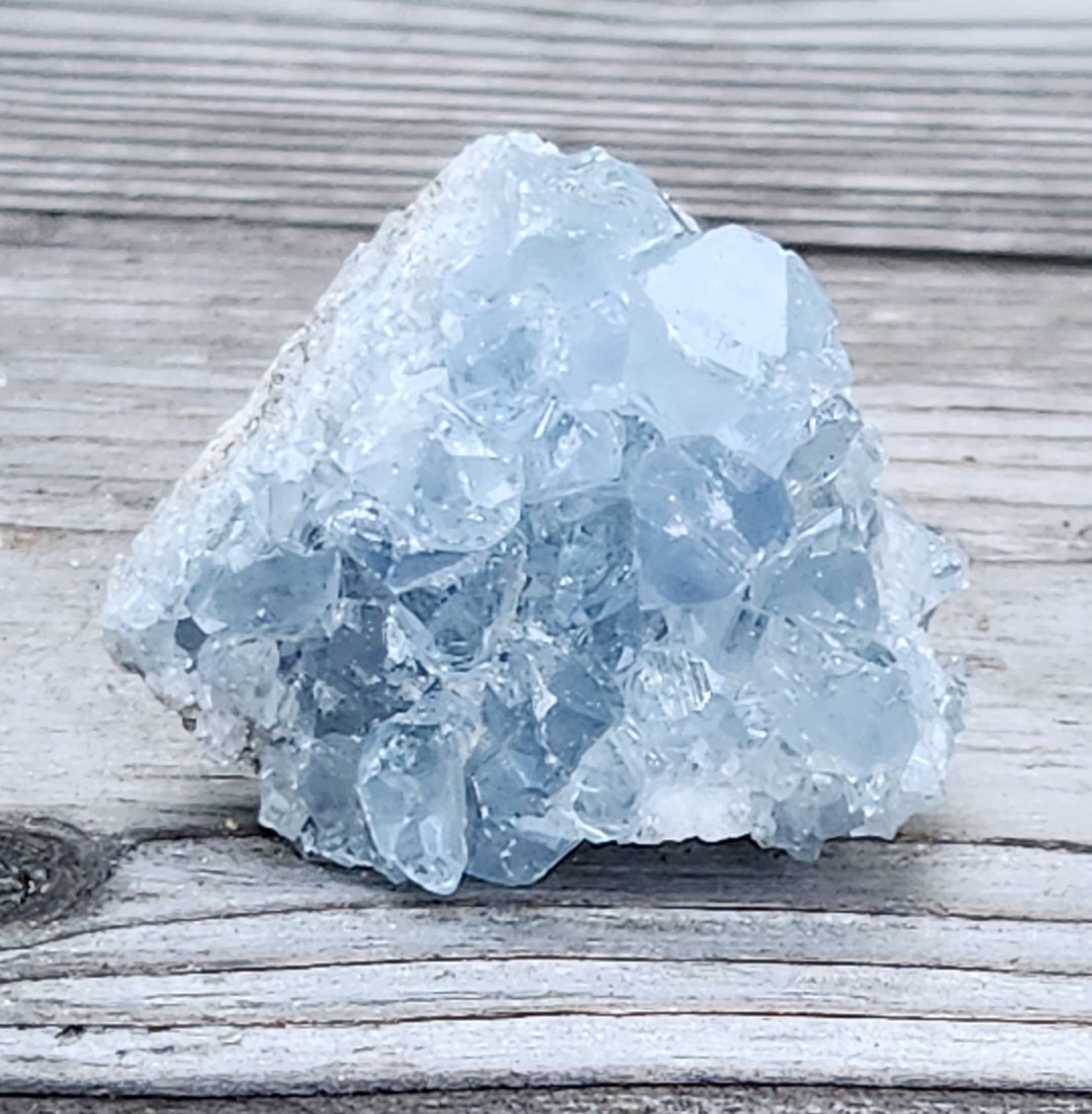 Natural Celestite crystal cluster with translucent blue terminations, item RC433