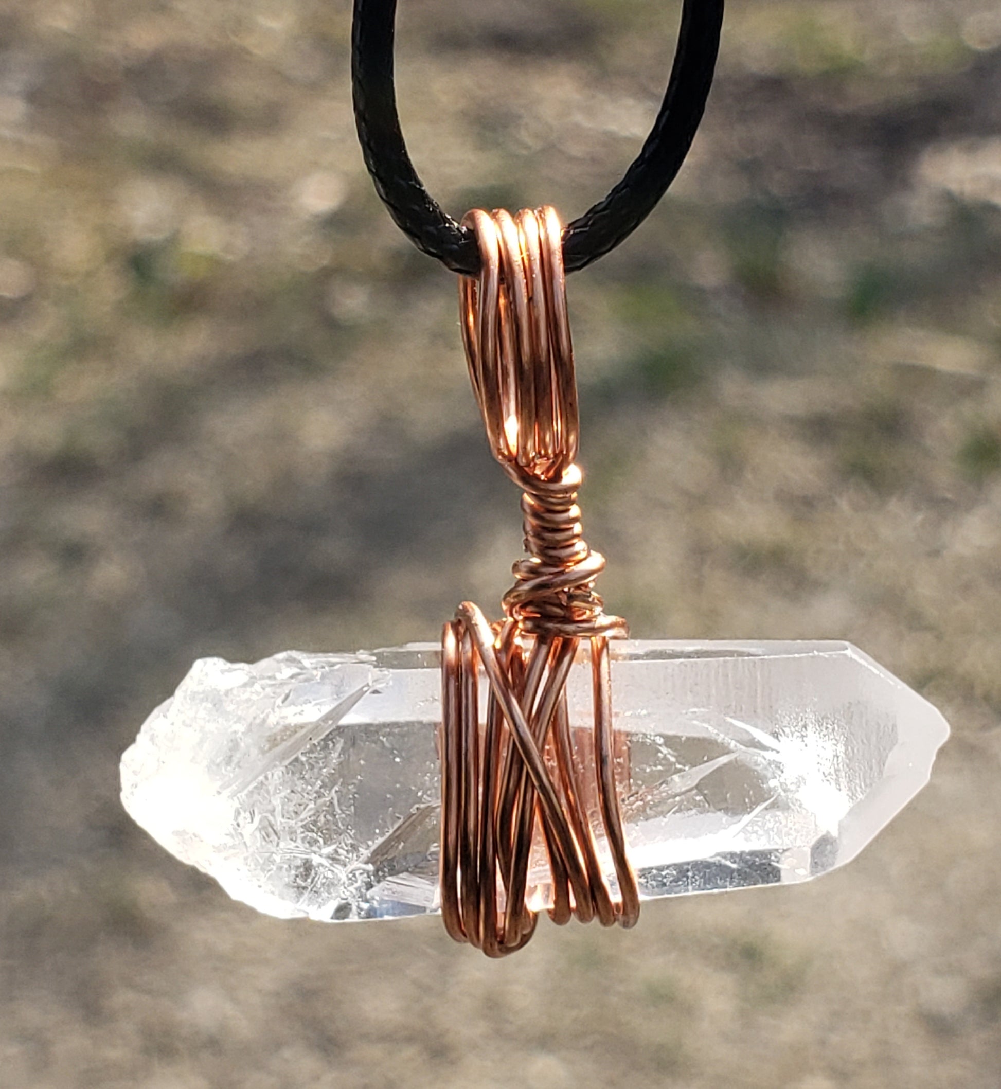 Copper wire wrapped clear quartz crystal point necklace main close