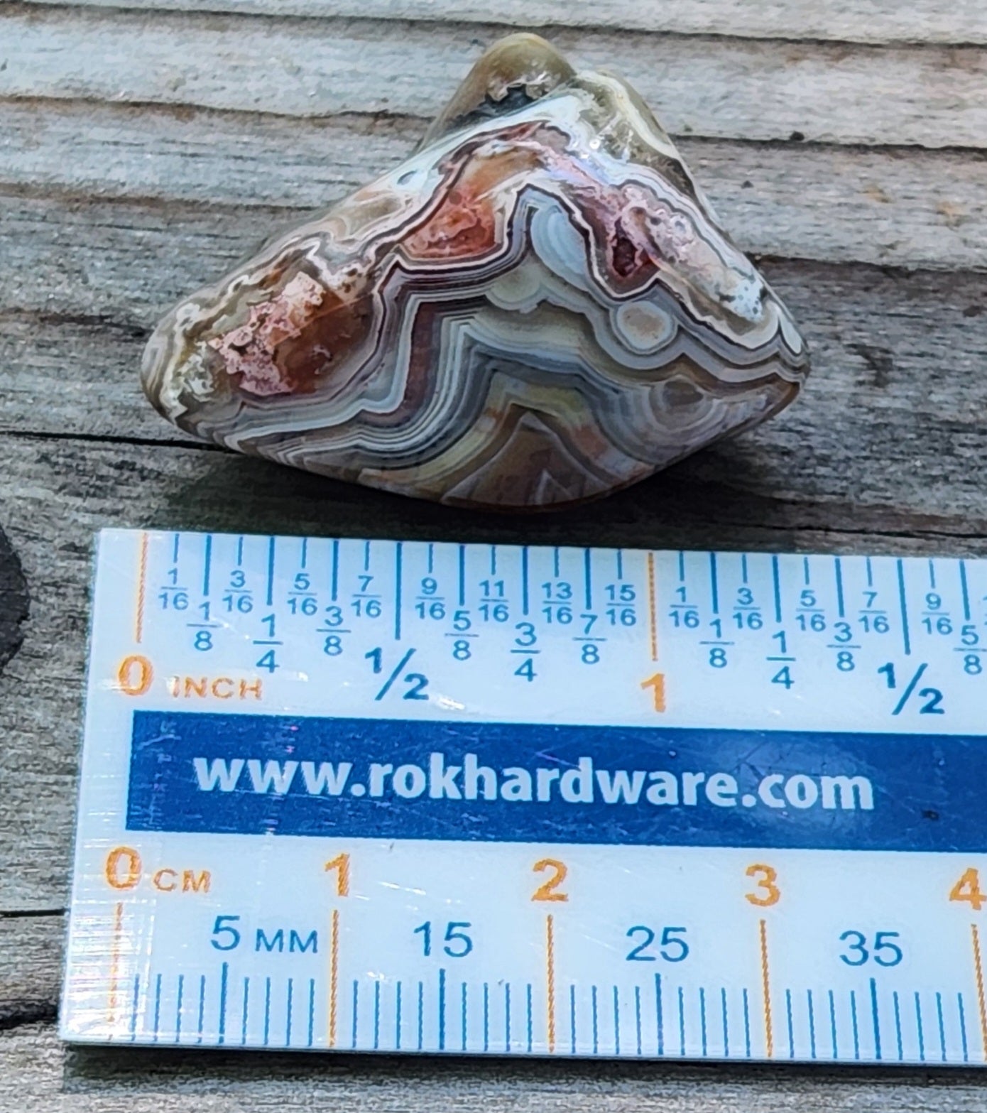 Mexican Crazy Lace Agate displayed with ruler for size reference, TA366