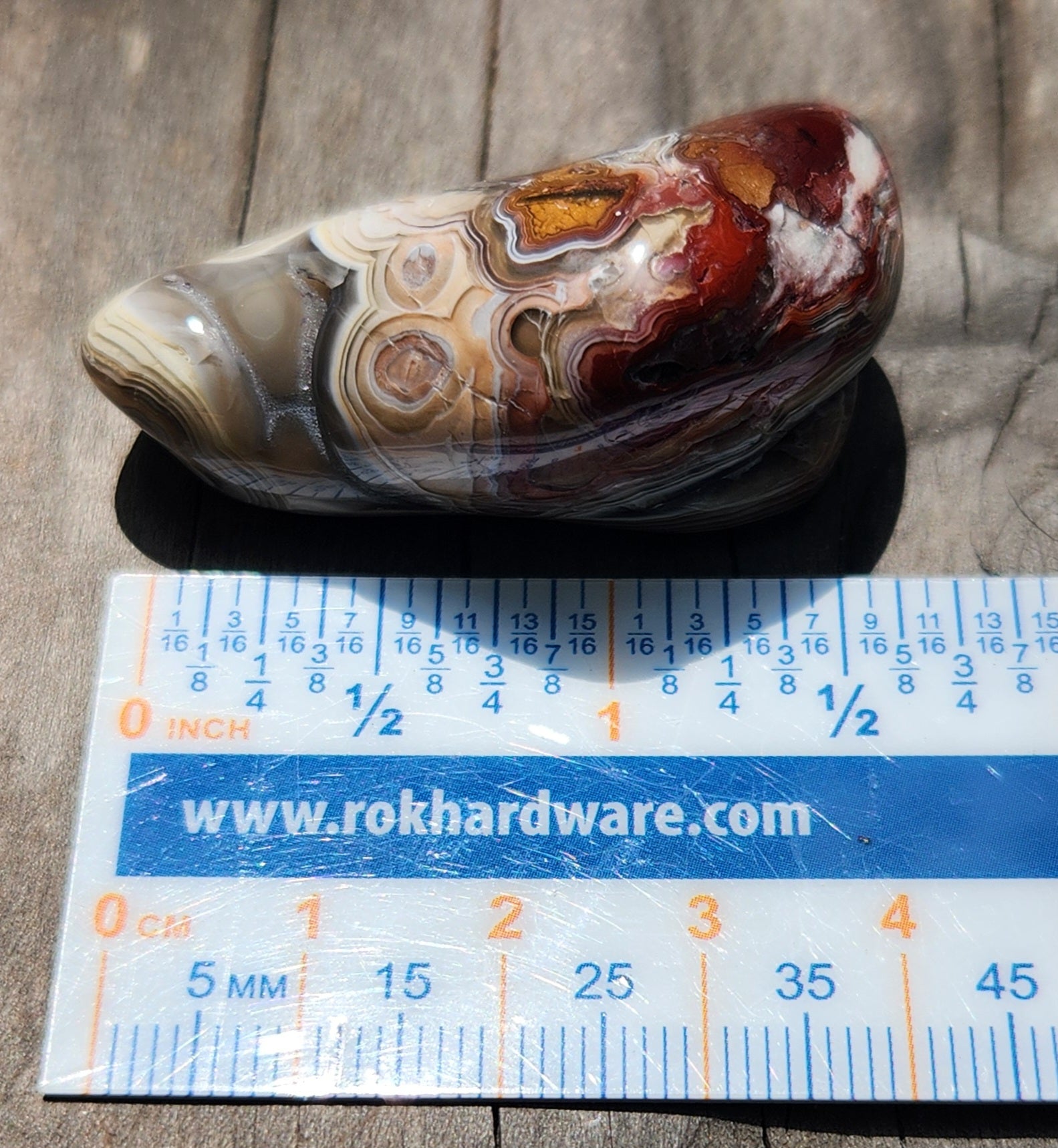 Mexican Crazy Lace Agate displayed with ruler for size reference, TA367