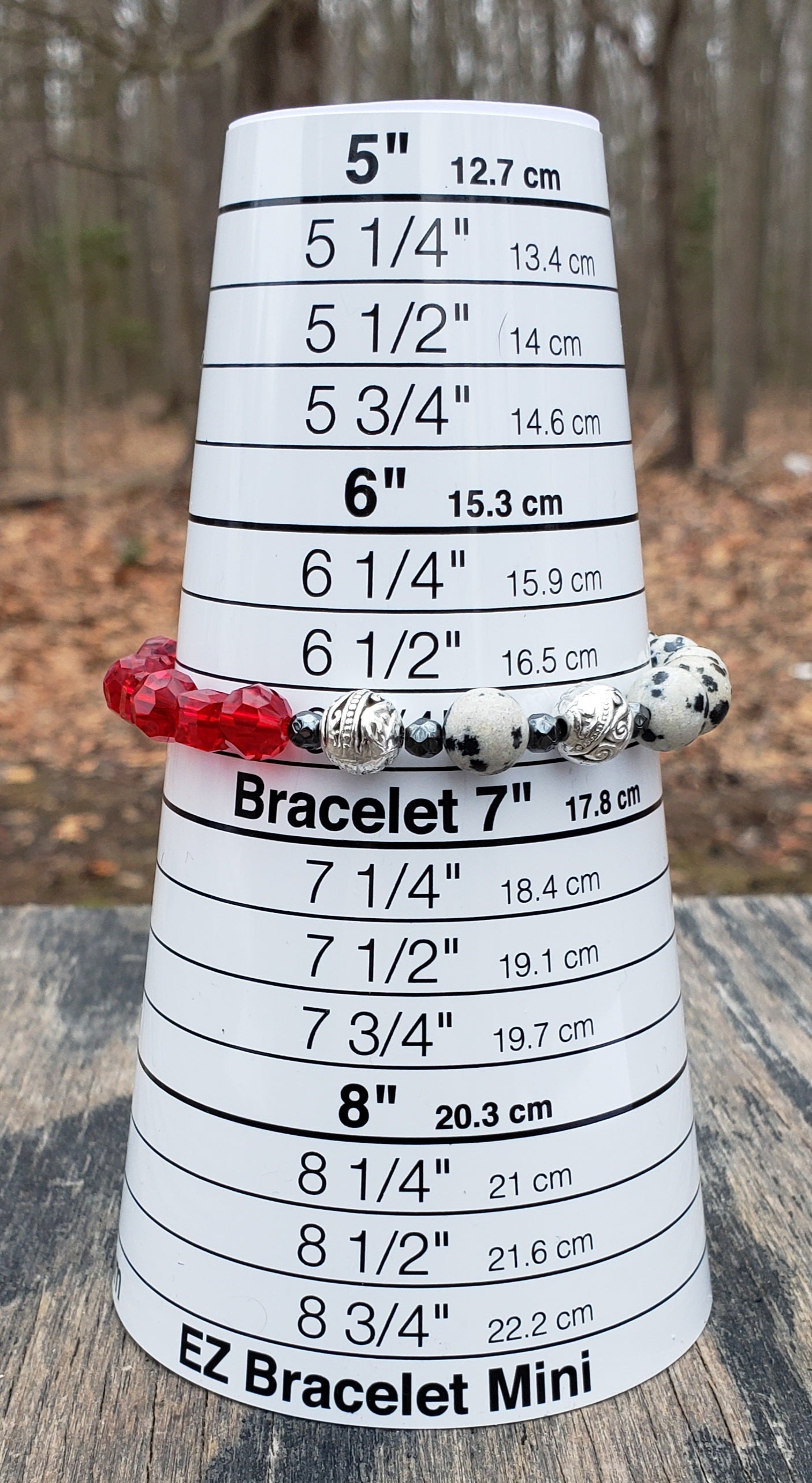 dalmatian stone red glass stretch bracelet on shown for size