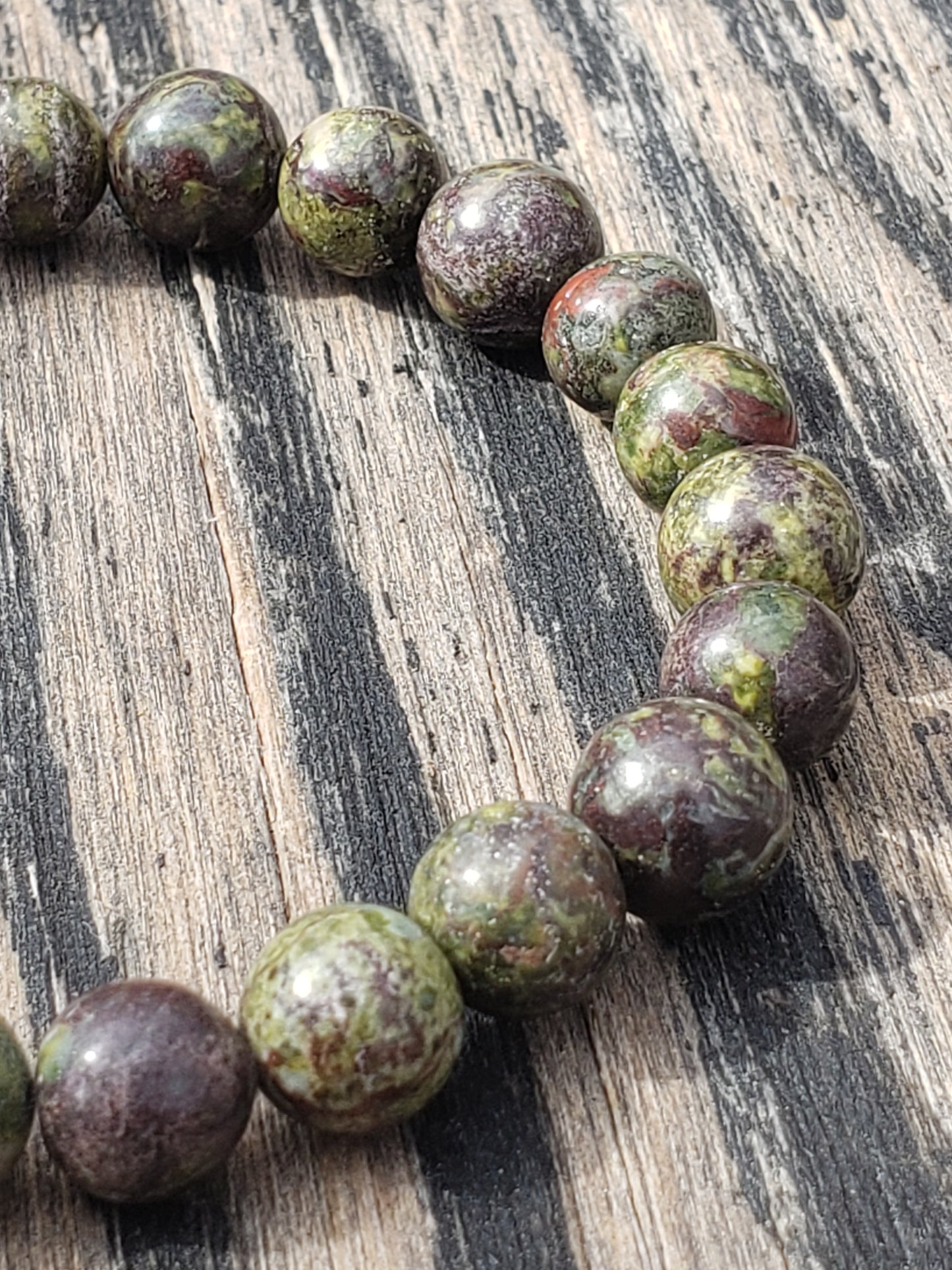 Natural Dragon’s Blood jasper stretch bracelet close up
