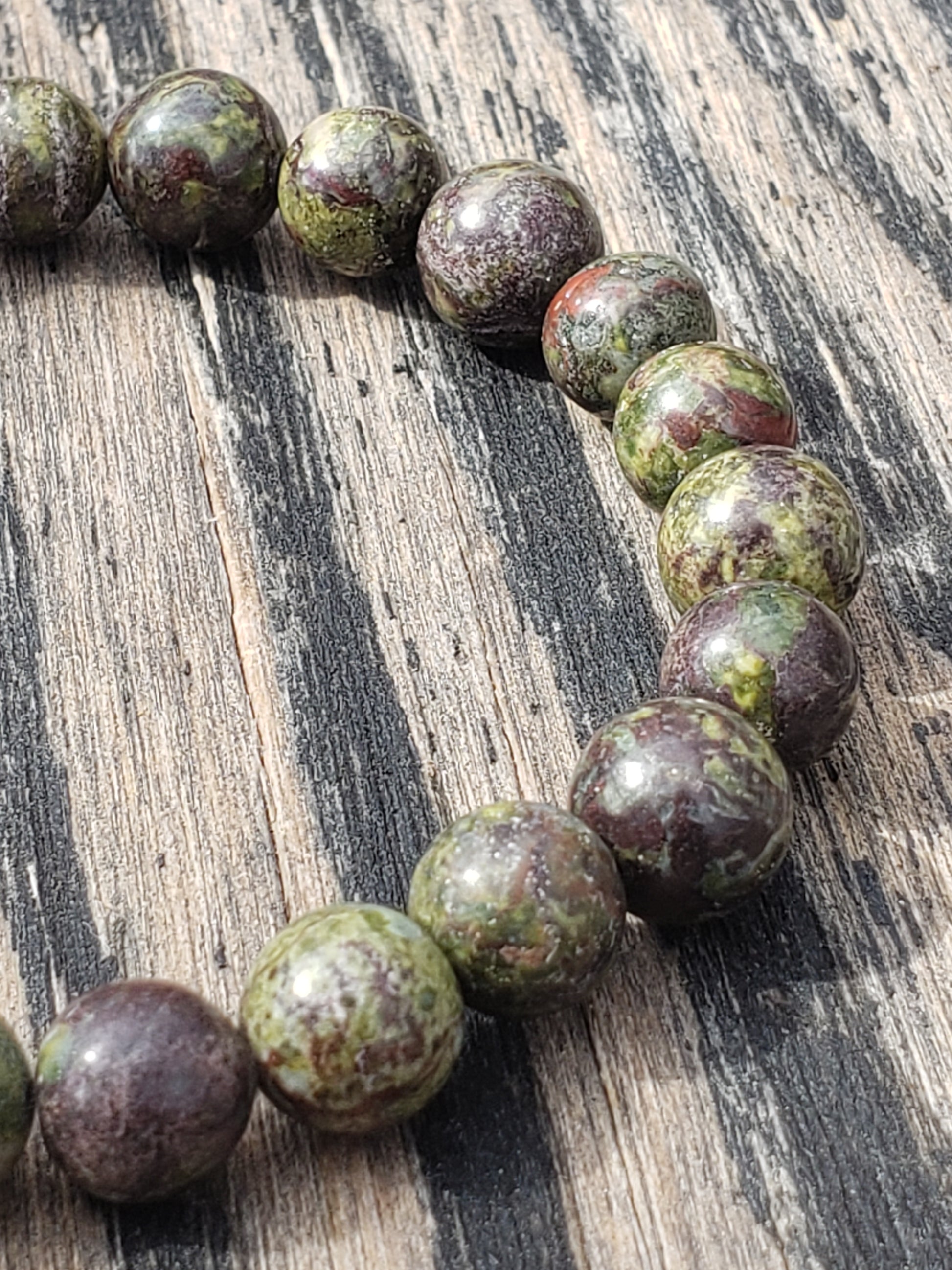 Natural Dragon’s Blood jasper stretch bracelet close up
