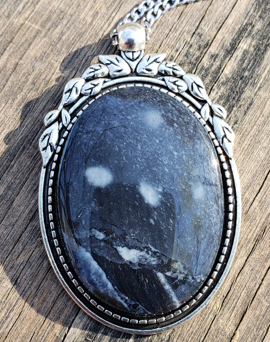 Blue dendritic necklace with 40×30 mm stone close up full front