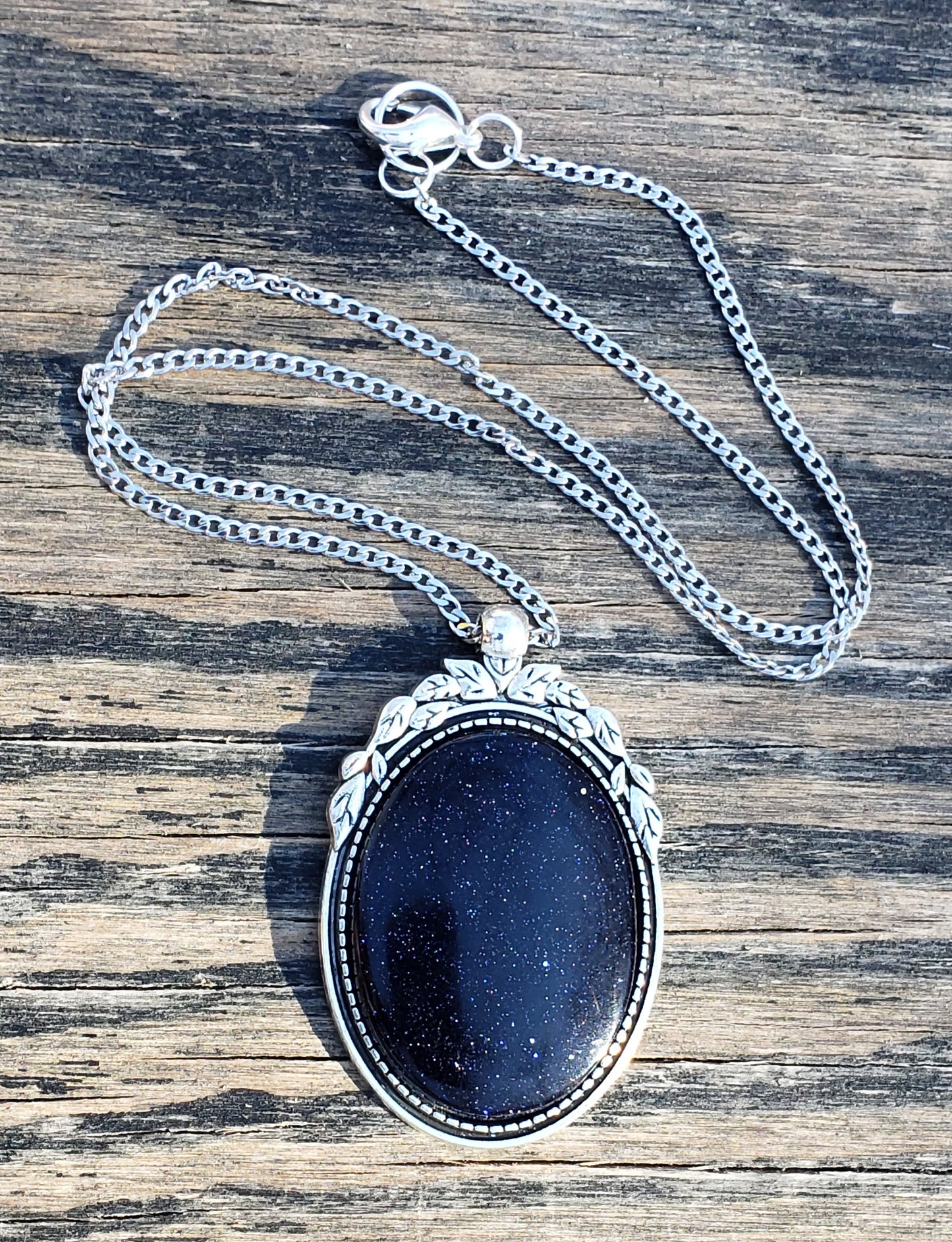 Blue goldstone necklace with 40×30 mm oval stone pendant with chain