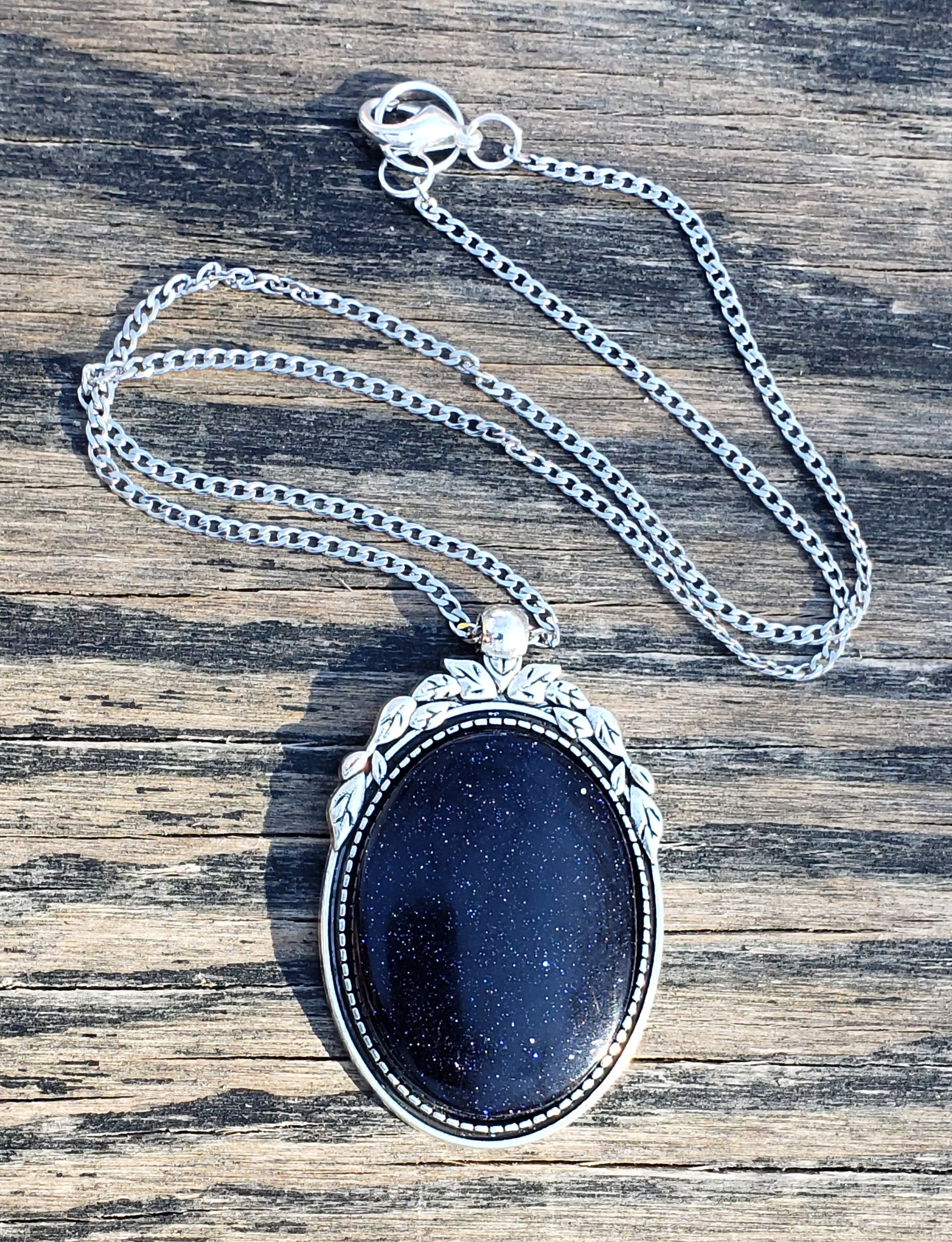 Blue goldstone necklace with 40×30 mm oval stone pendant with chain