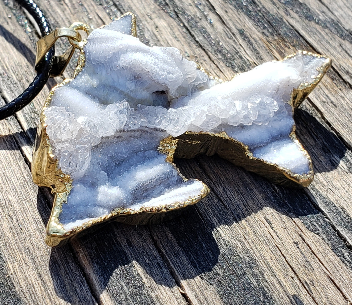 druzy dolphin necklace with crystals close up