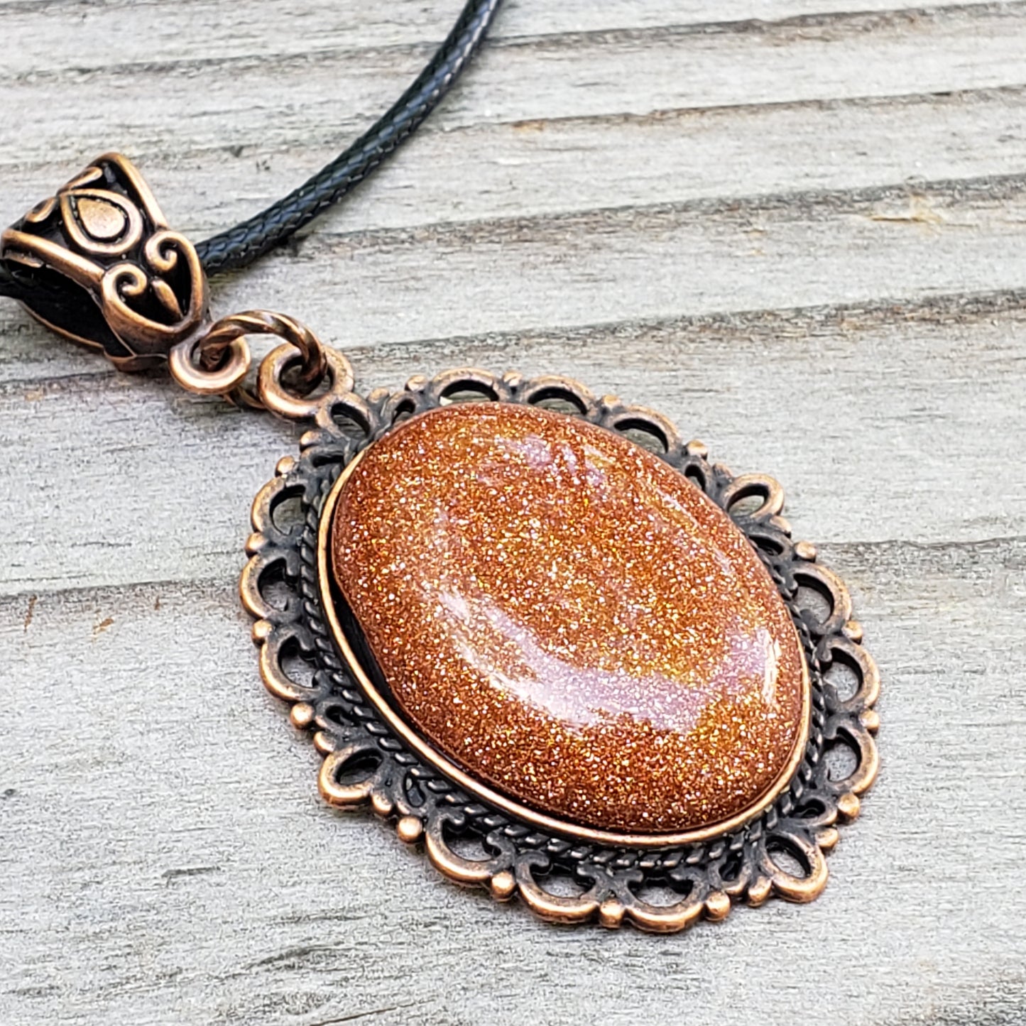 Goldstone necklace with 25×18 mm stone pendant