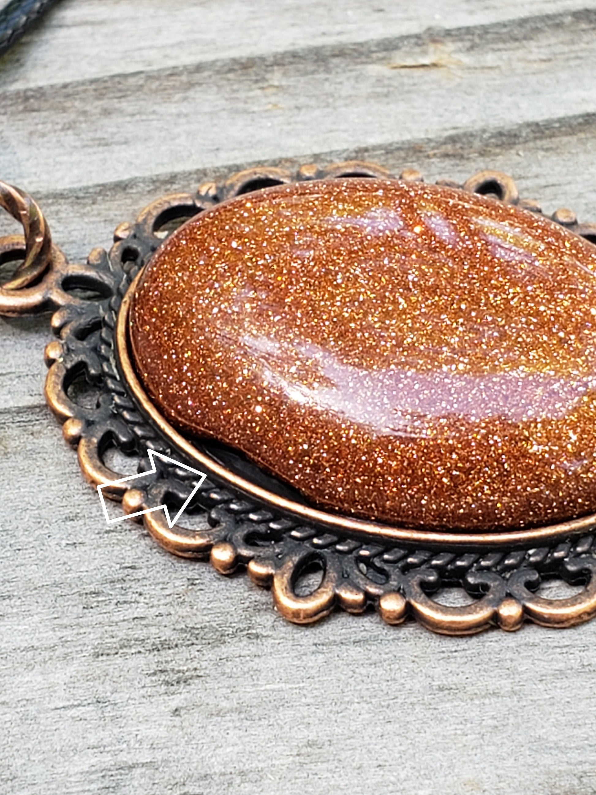 Goldstone necklace with 25×18 mm stone pendant close