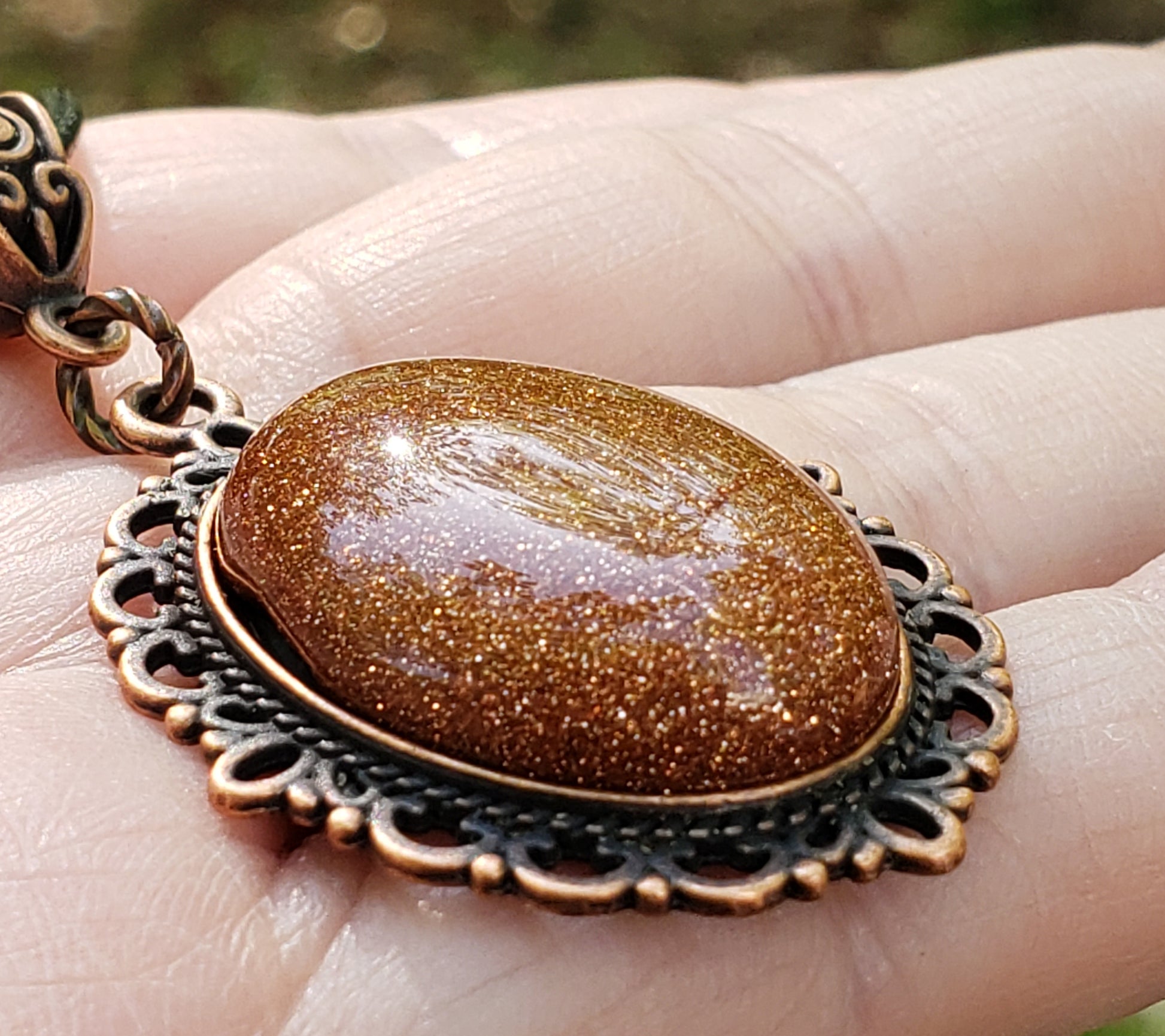 Goldstone necklace with 25×18 mm stone pendant close up