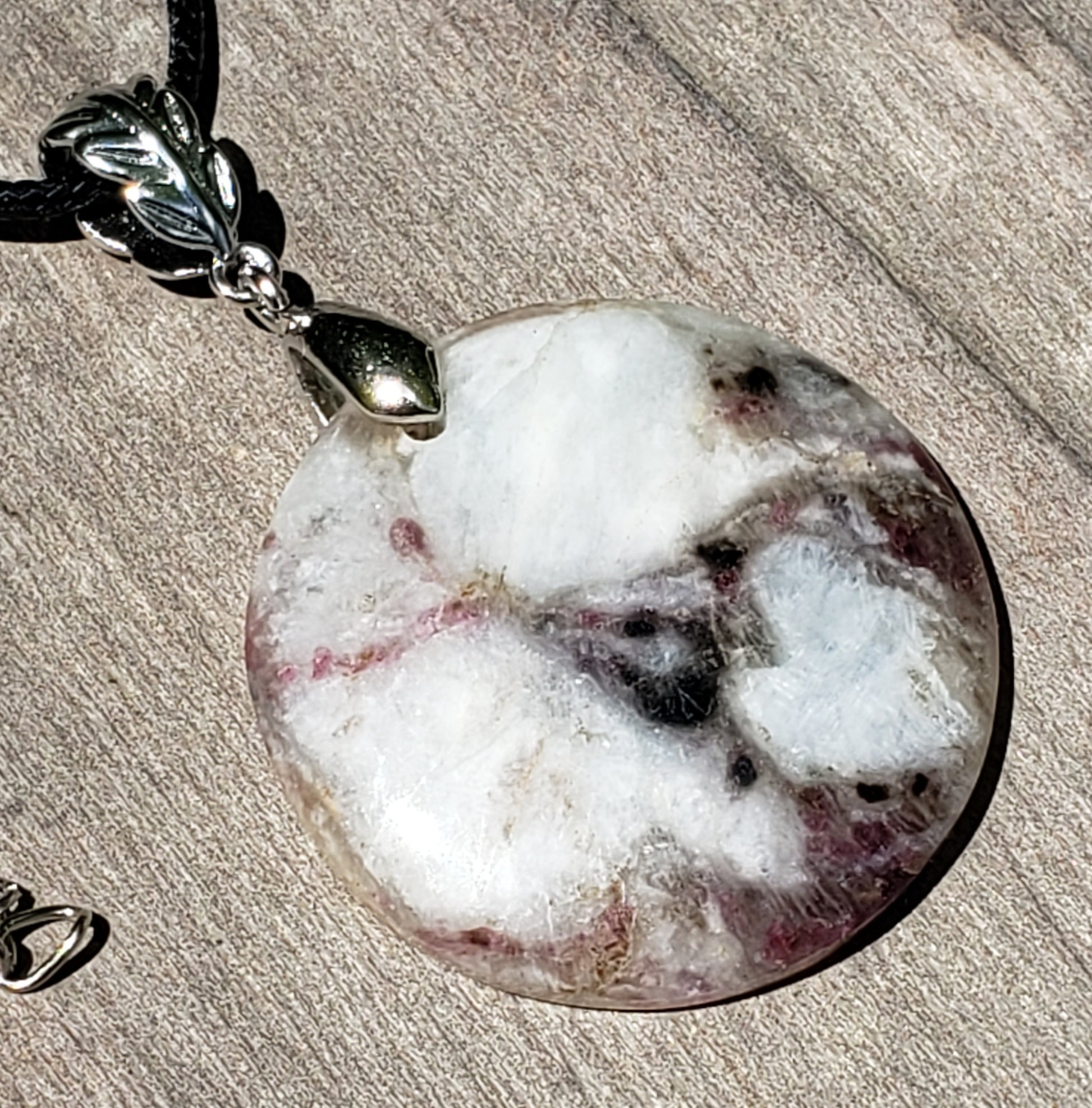 Mystery necklace with  round natural stone pendant