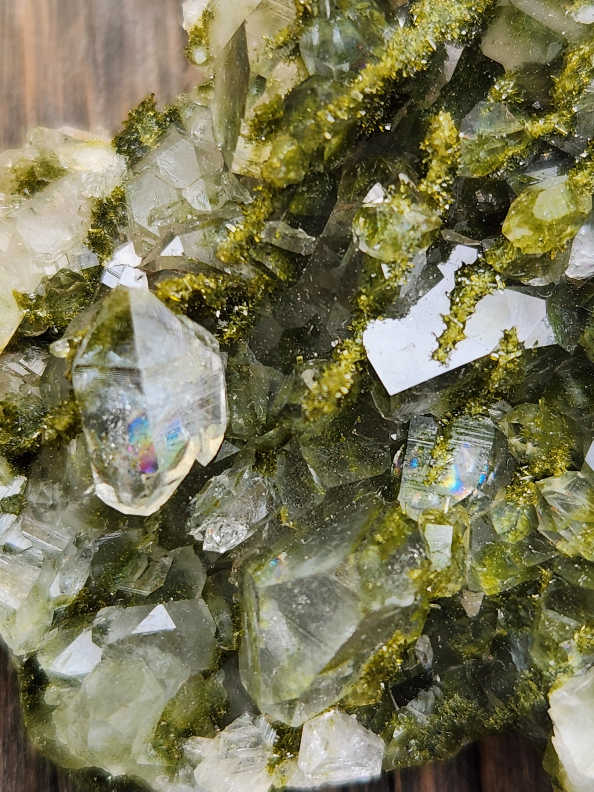 Extreme Close-up of green epidote crystals and clear quartz on natural matrix from Hakkari Turkey. SP466