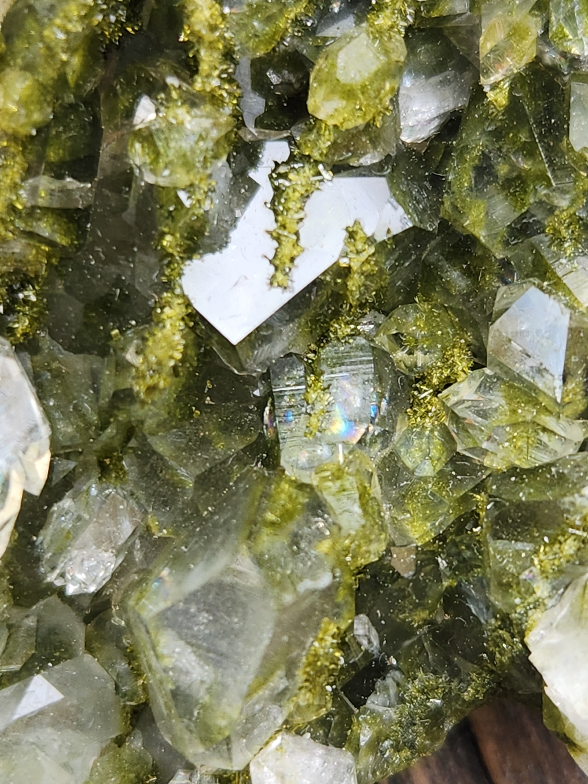 Extreme Close-up of green epidote crystals and clear quartz on natural matrix from Hakkari Turkey. SP466-02
