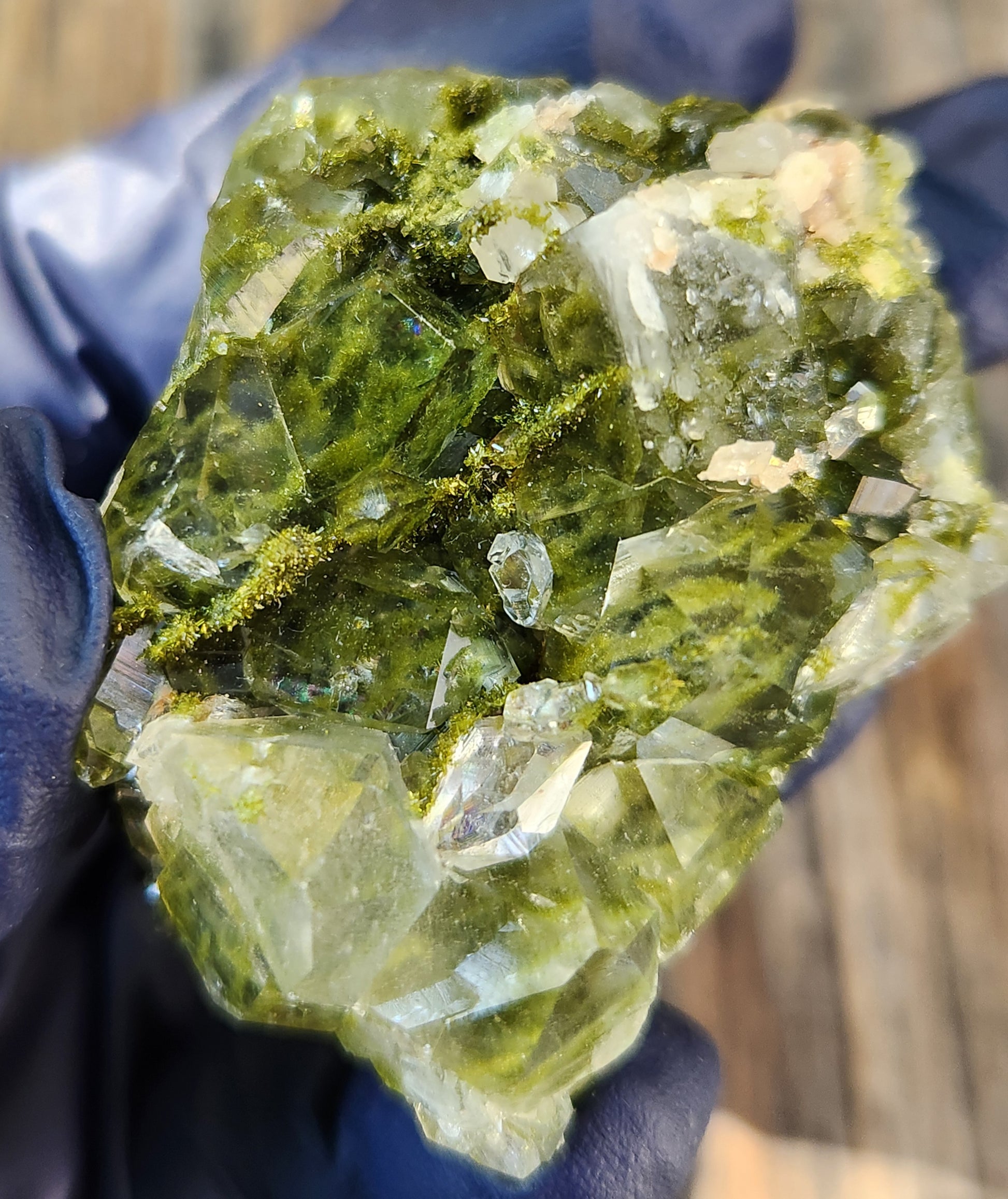 Close-up of green epidote crystals and clear quartz on natural matrix from Hakkari Turkey. SP455