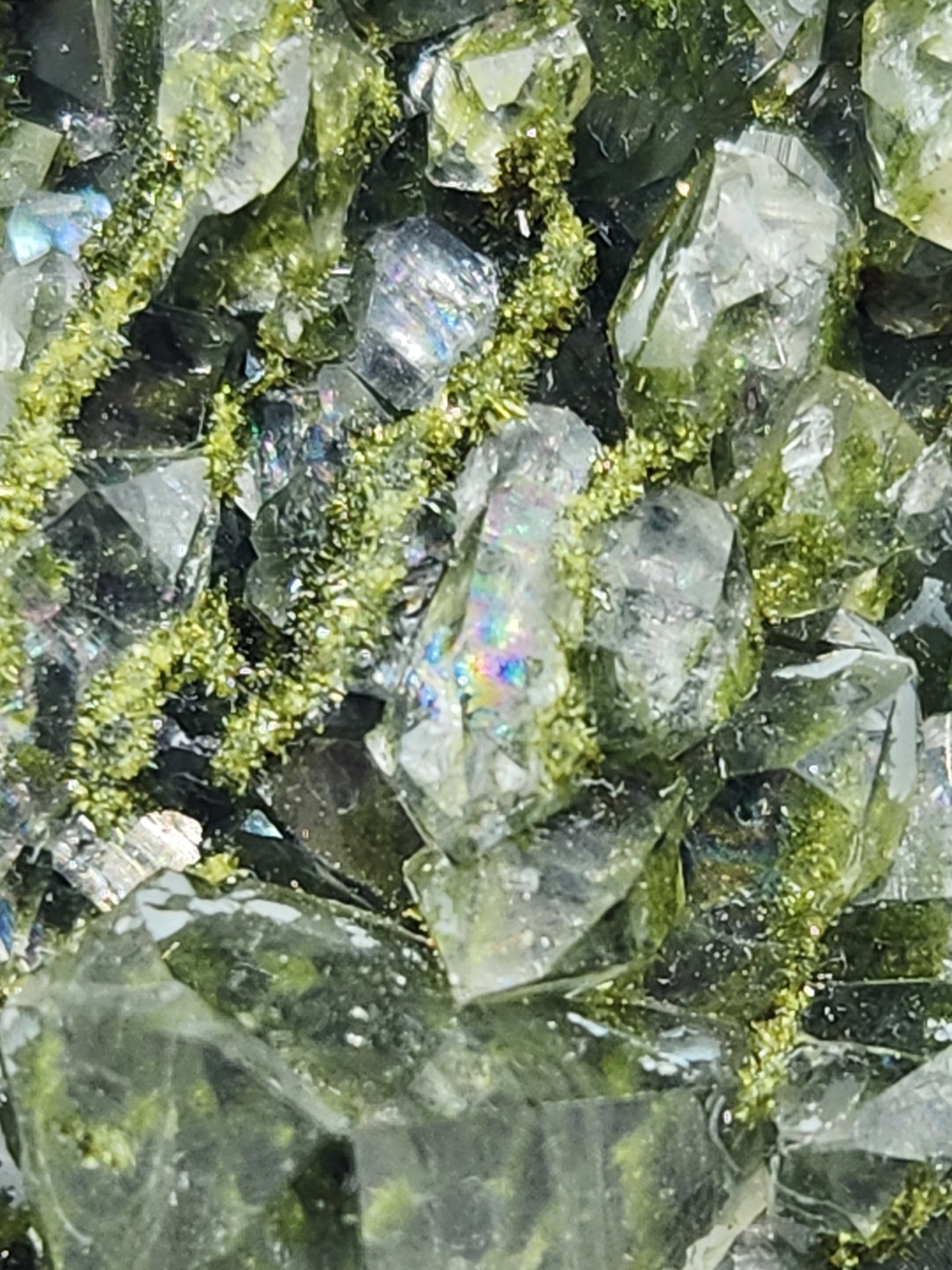 Close-up of green epidote crystals and clear quartz on natural matrix from Hakkari Turkey. SP457-01