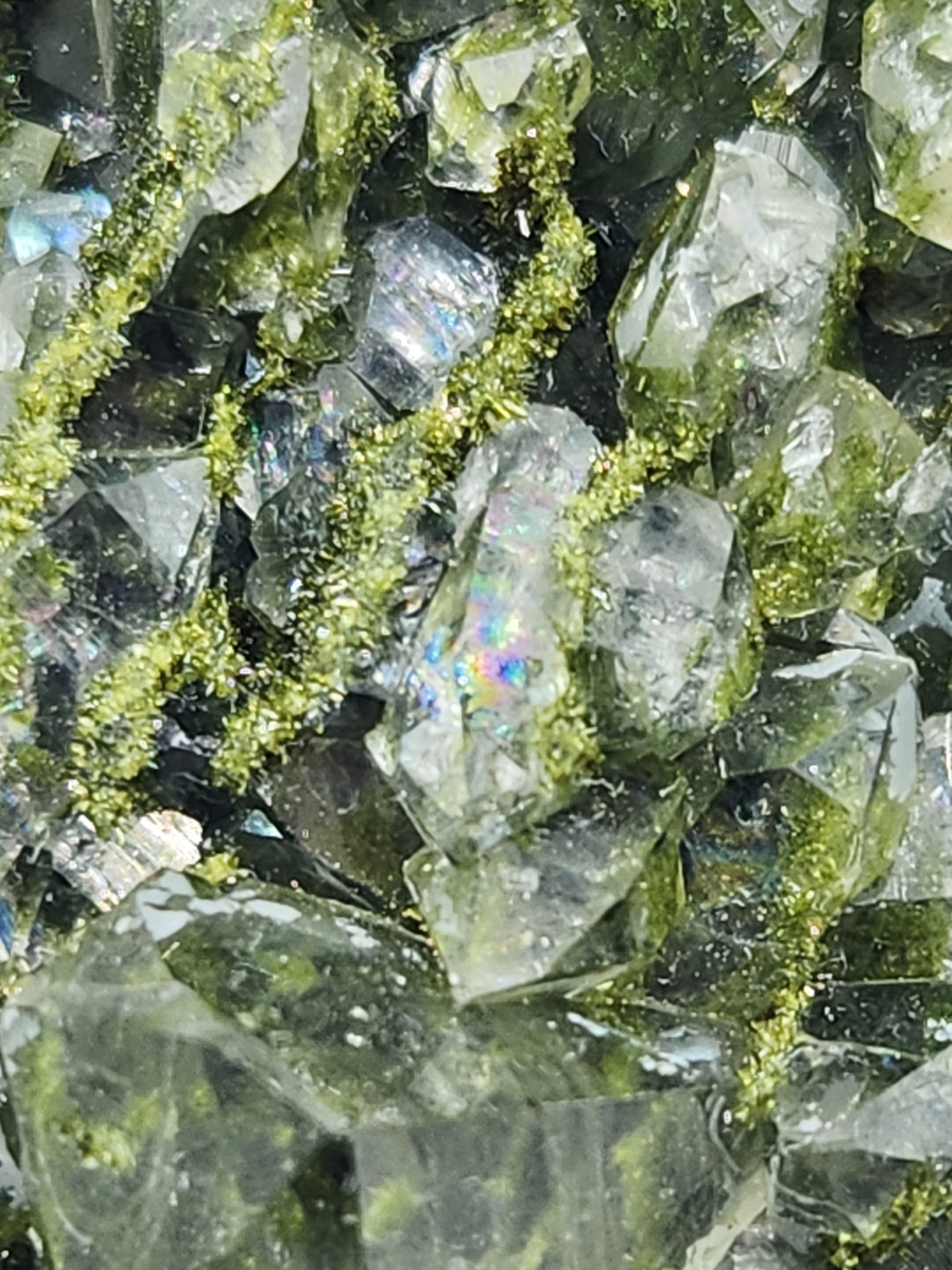 Close-up of green epidote crystals and clear quartz on natural matrix from Hakkari Turkey. SP457-01