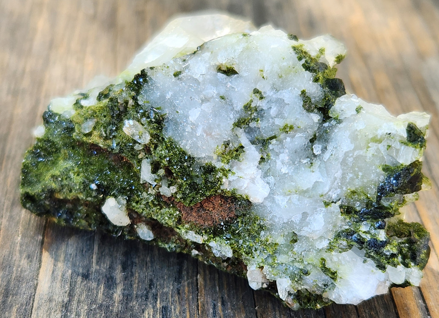 Close-up of green epidote crystals and clear quartz on natural matrix from Hakkari Turkey. SP461