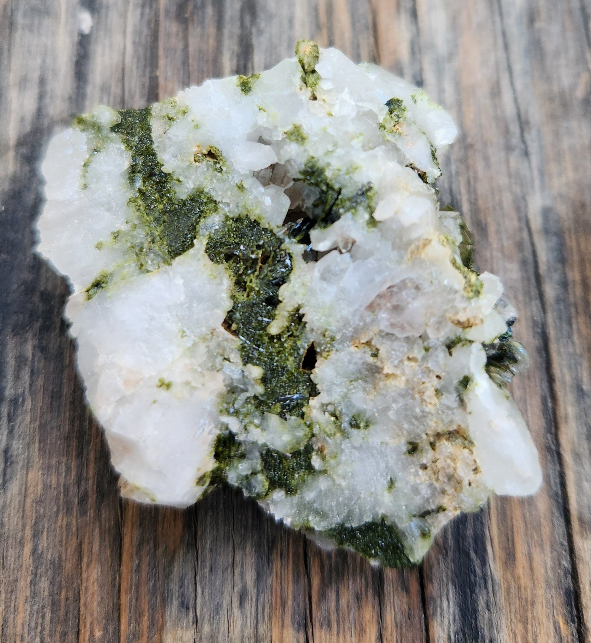 Close-up of green epidote crystals and clear quartz on natural matrix from Hakkari Turkey