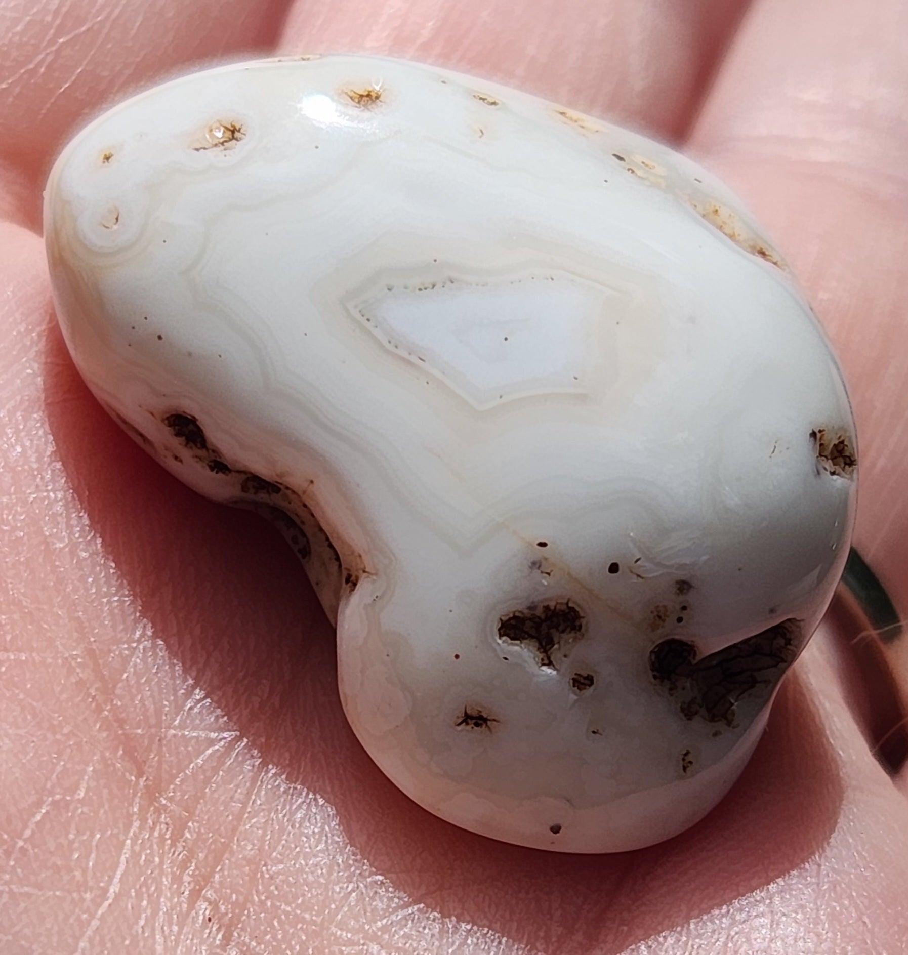 Natural Mexican agate displayed in hand TA270
