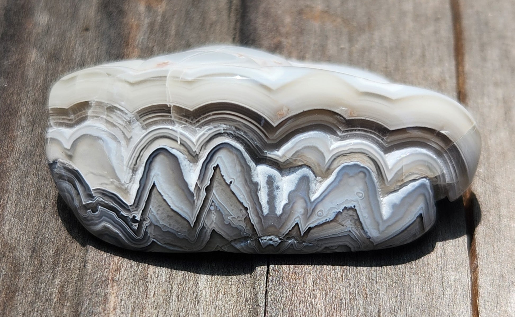 Polished Mexican Crazy Lace Agate featuring bold dark accent line, TA368