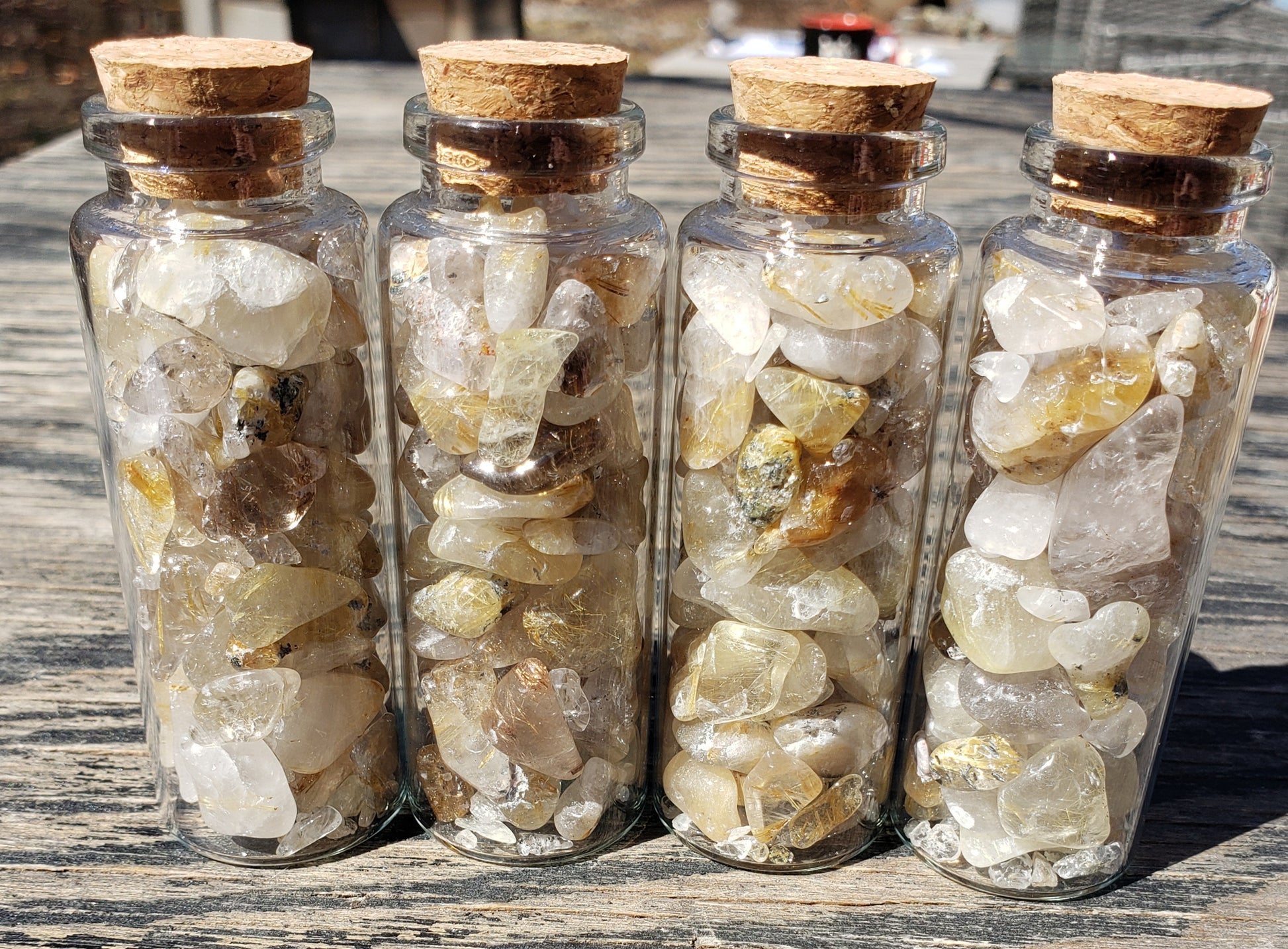Jumbo jar of polished tumbled Rutilated Quartz stones with needle-like inclusions, JJRRQ