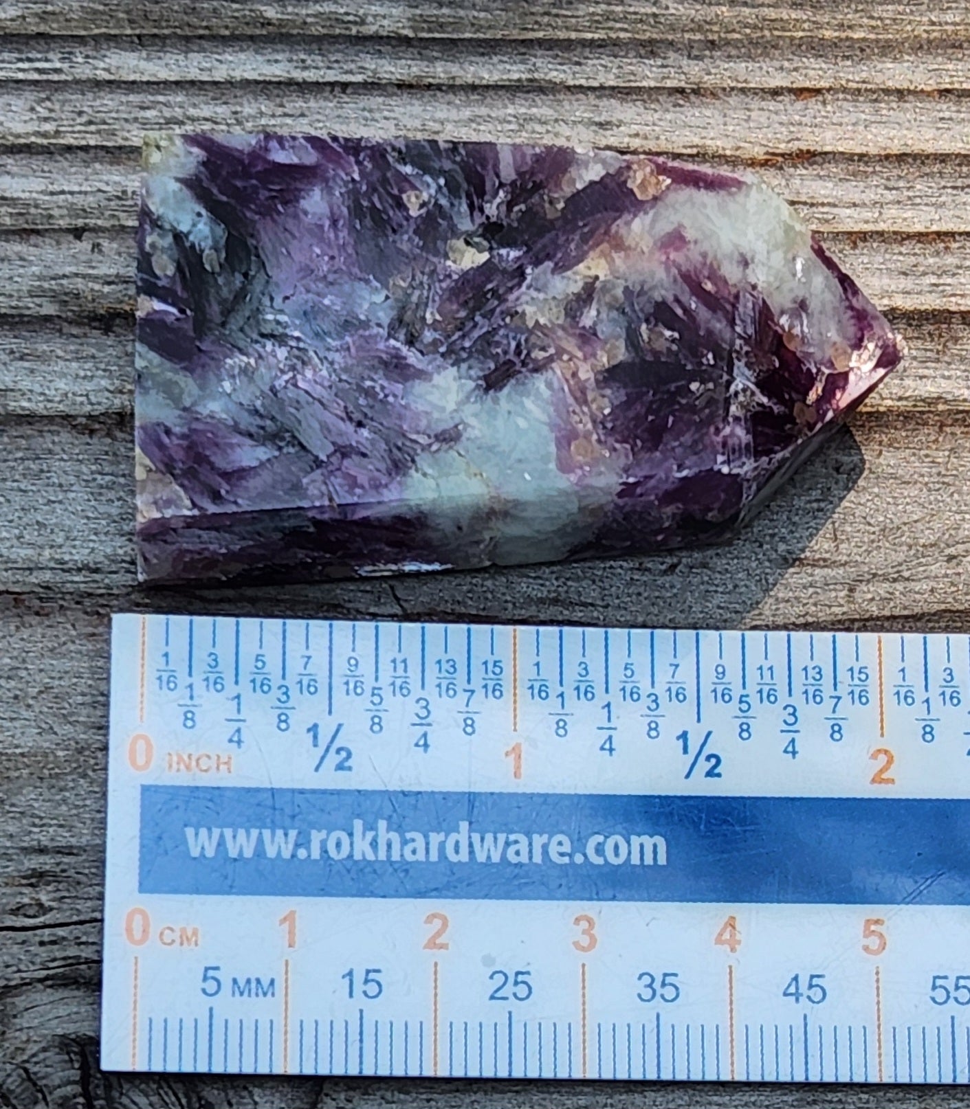 Natural lavender lepidolite crystal mini tower from multiple angles ruler