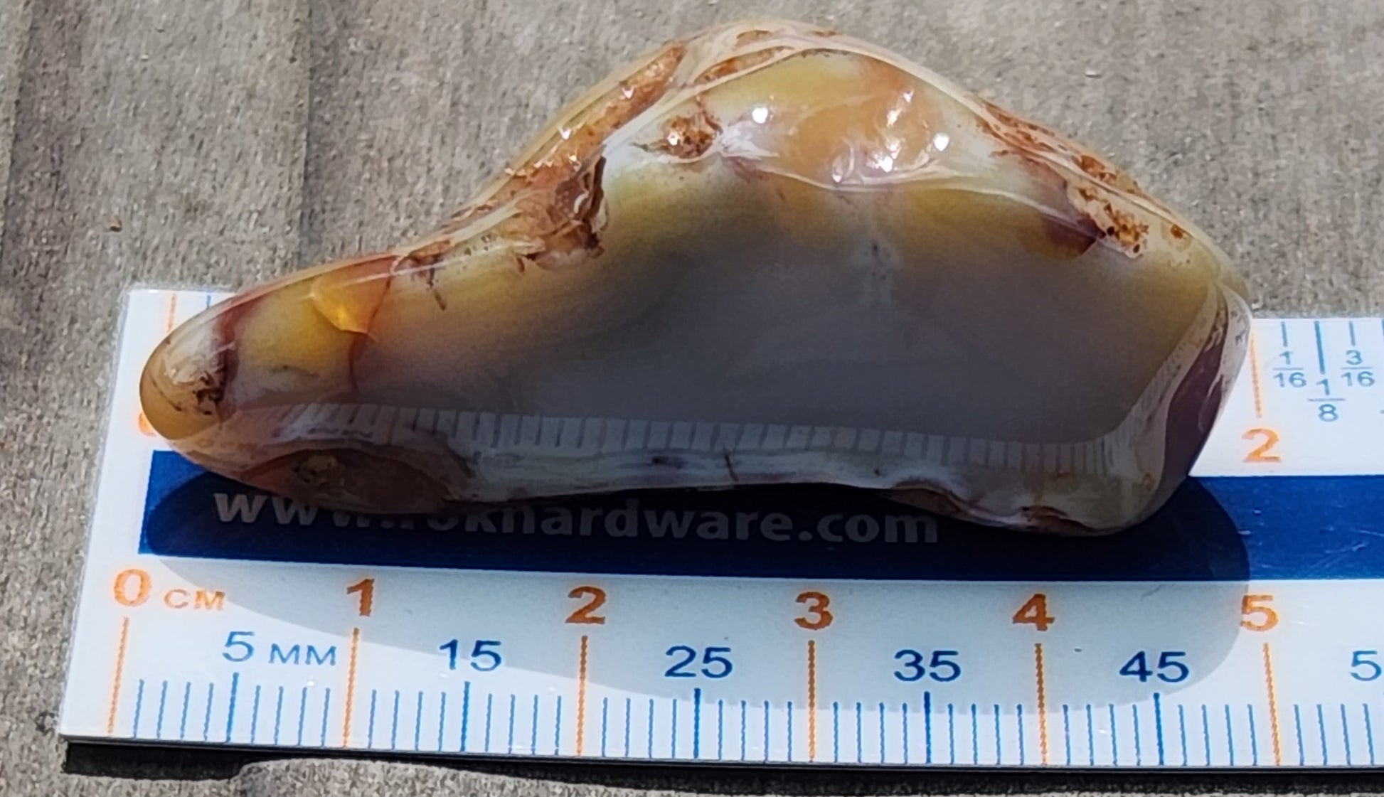 Mexican banded agate shown with ruler for scale TA276