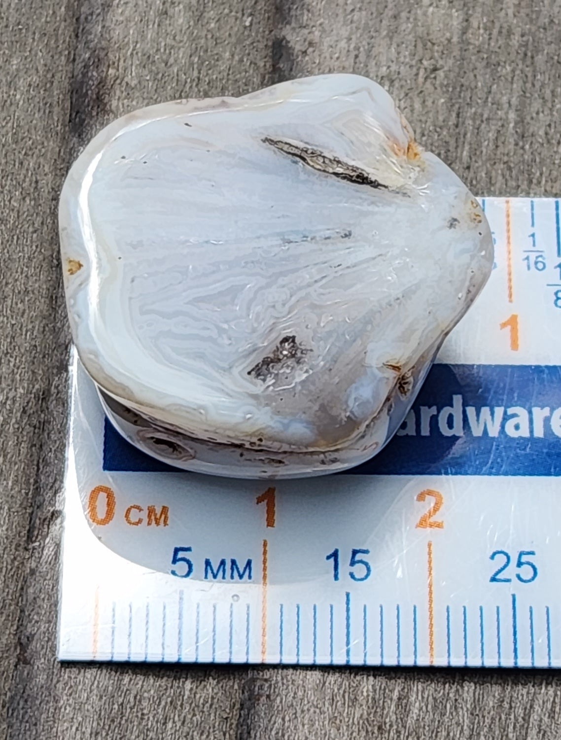 Mexican agate displayed with ruler TA271