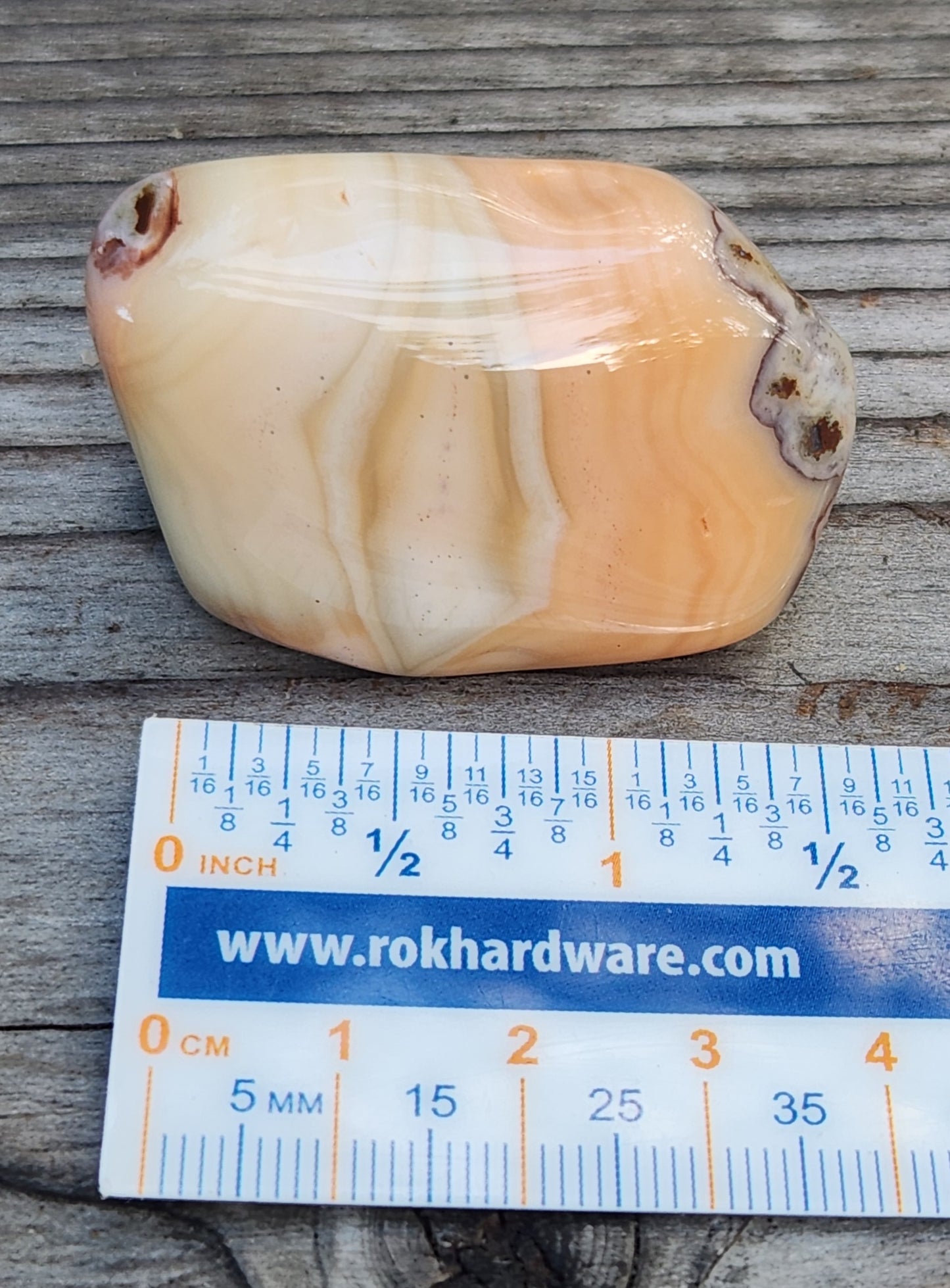 Mexican agate shown with ruler TA333