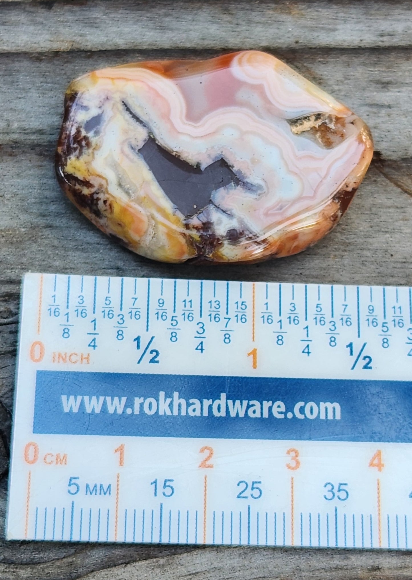 Mexican agate displayed with ruler TA334