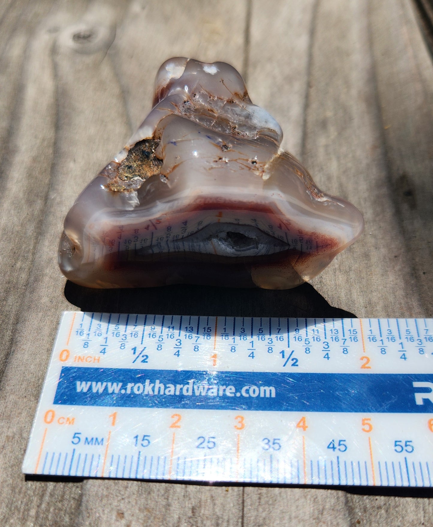 Mexican agate displayed on ruler for reference TA325