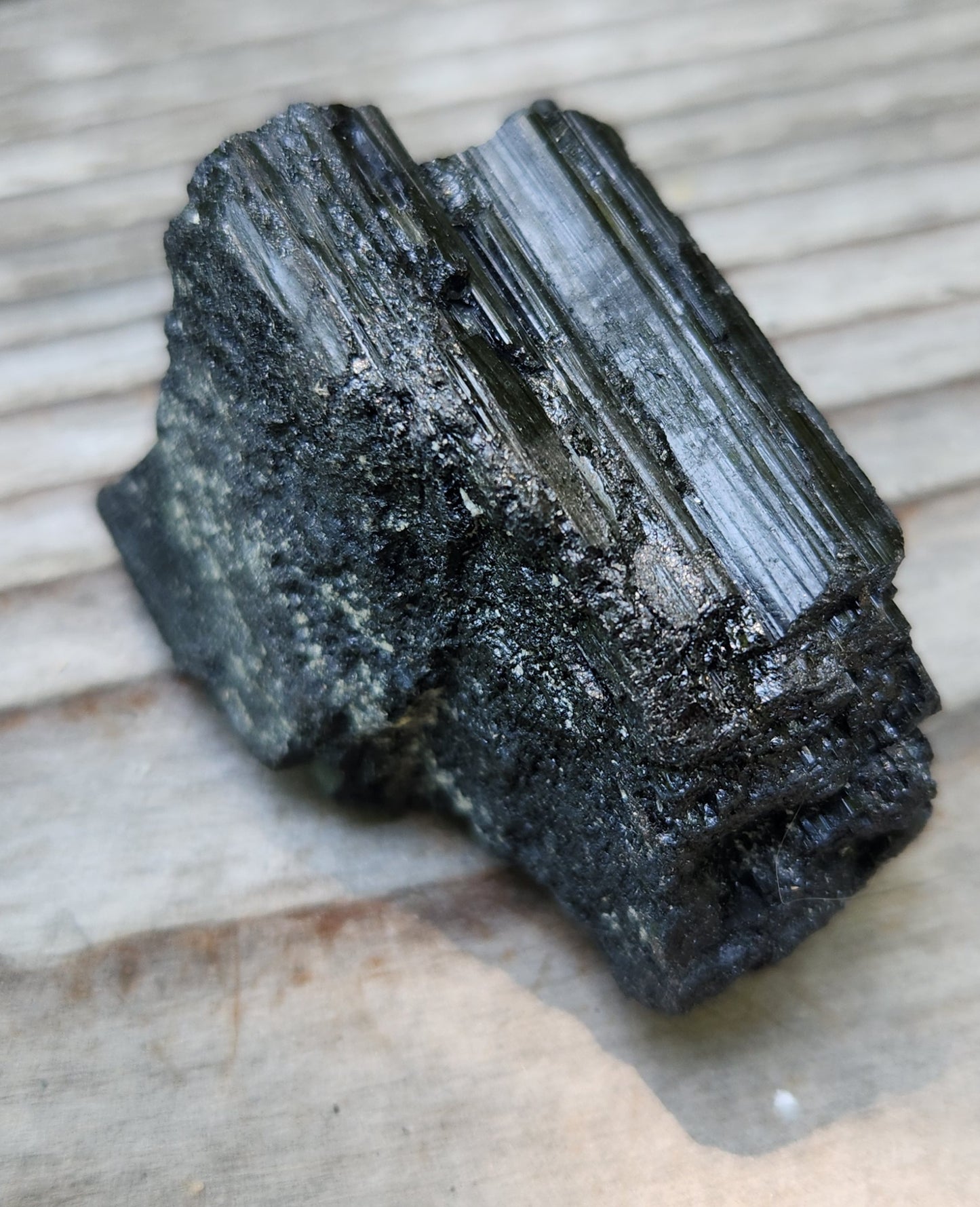 Rough black tourmaline mineral specimen with well-defined striation texture, item RC427