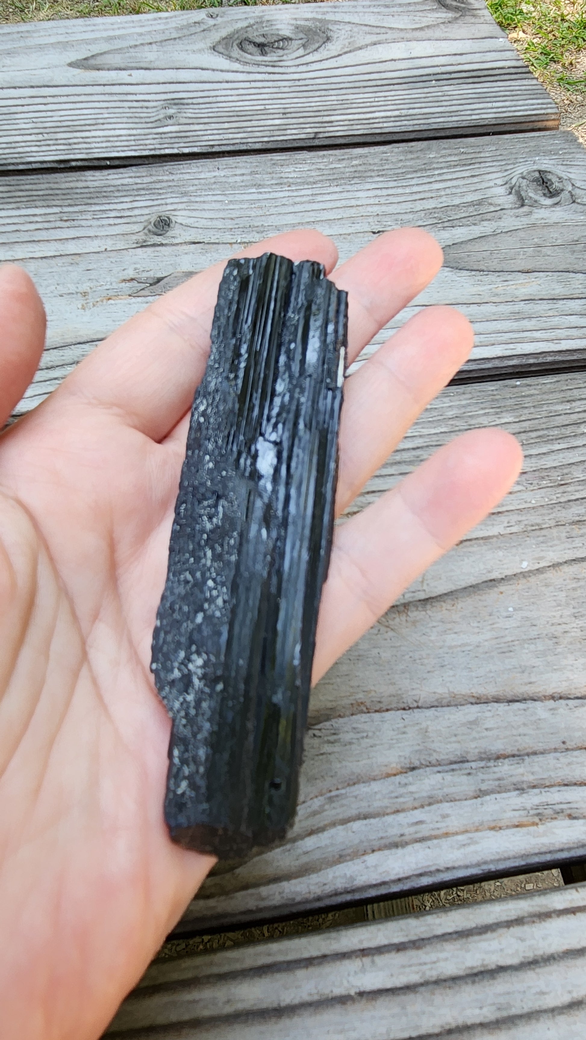 Rough black tourmaline mineral specimen with well-defined striation texture, item RC429