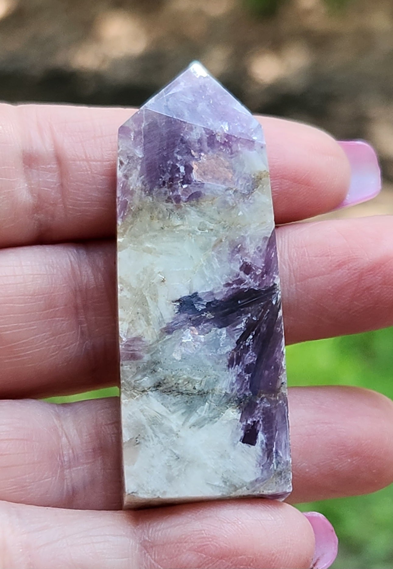 Polished lepidolite crystal tower showing natural mica texture and lavender tones, CV316