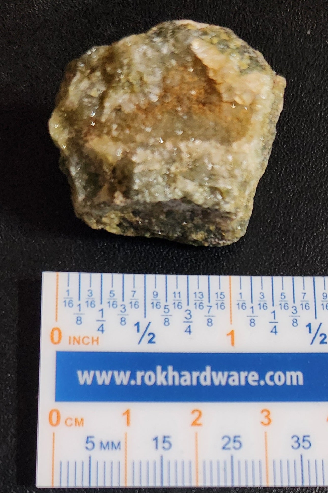 Close-up of small ocean jasper druzy showing micro-crystals ruler