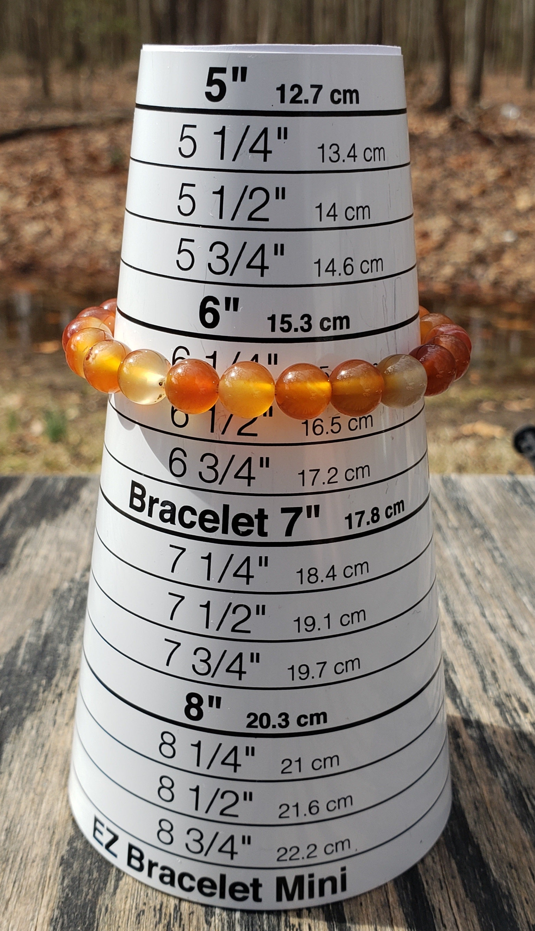 Orange agate stretch bracelet on bracelet sizer