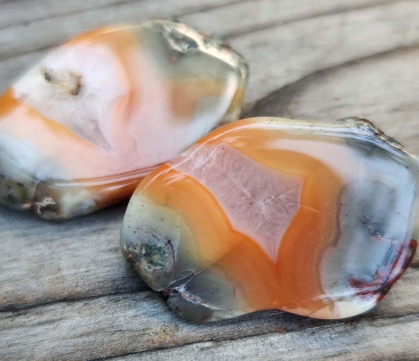 Polished peach orange agate halves TA329