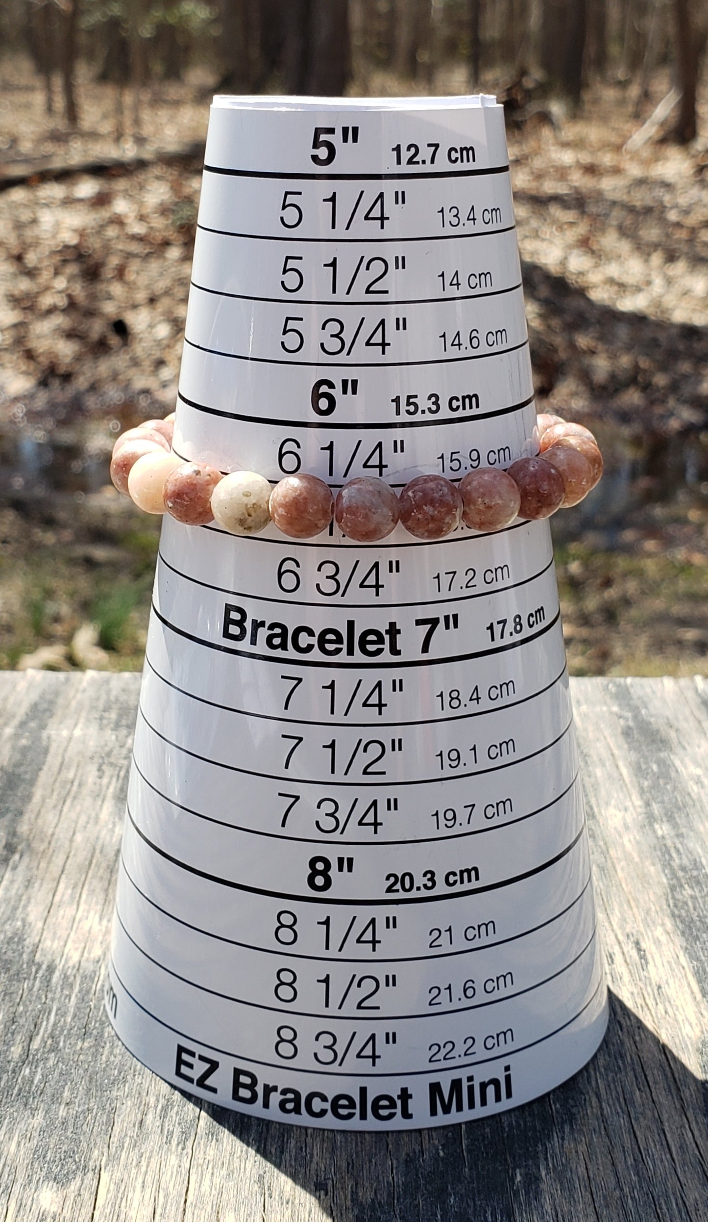 pink lepidolite bracelet on bracelet sizer cone
