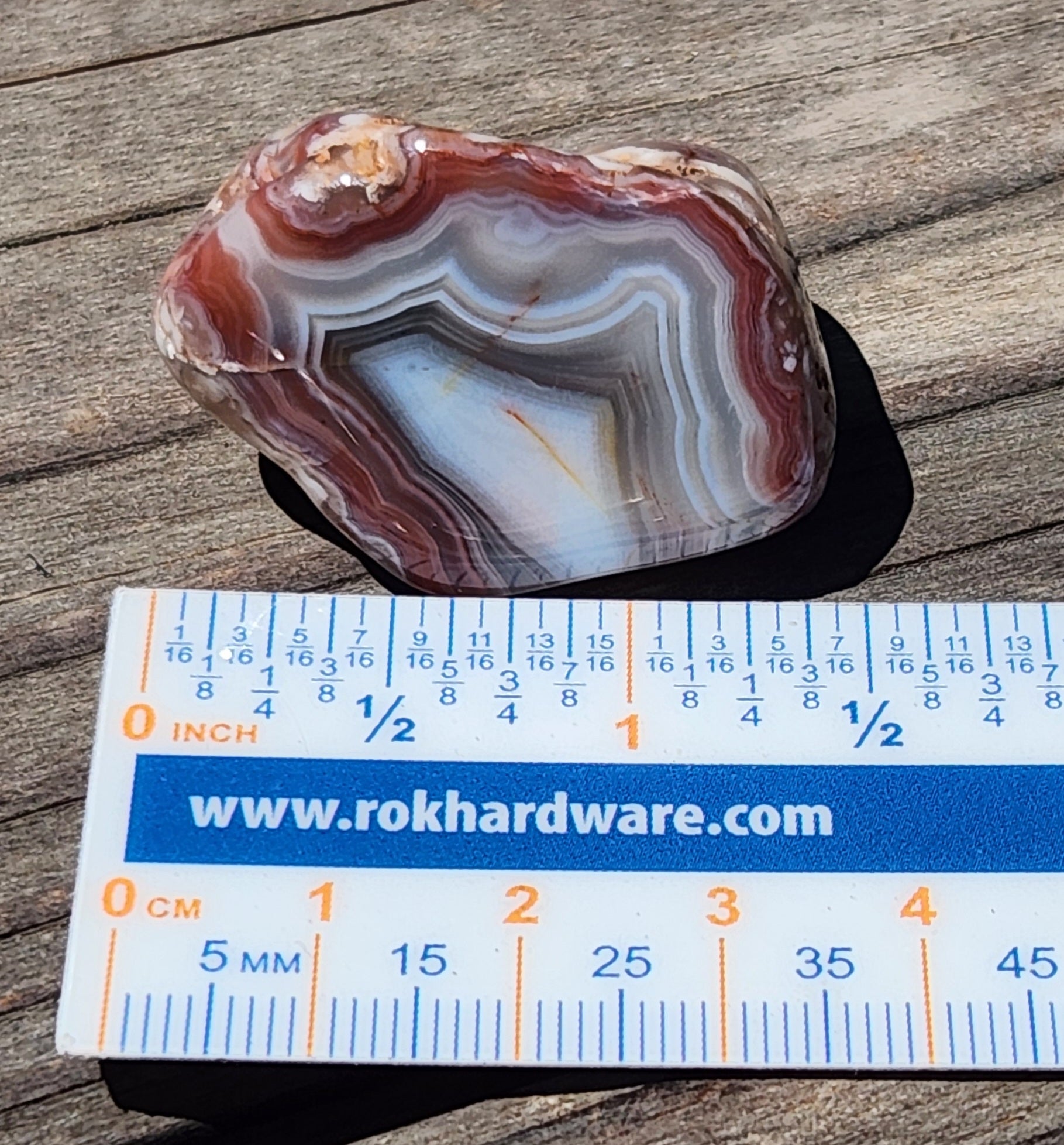 Mexican agate displayed with ruler TA330