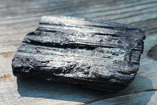 Raw black tourmaline crystal with natural prismatic growth and vertical striations, item RC423