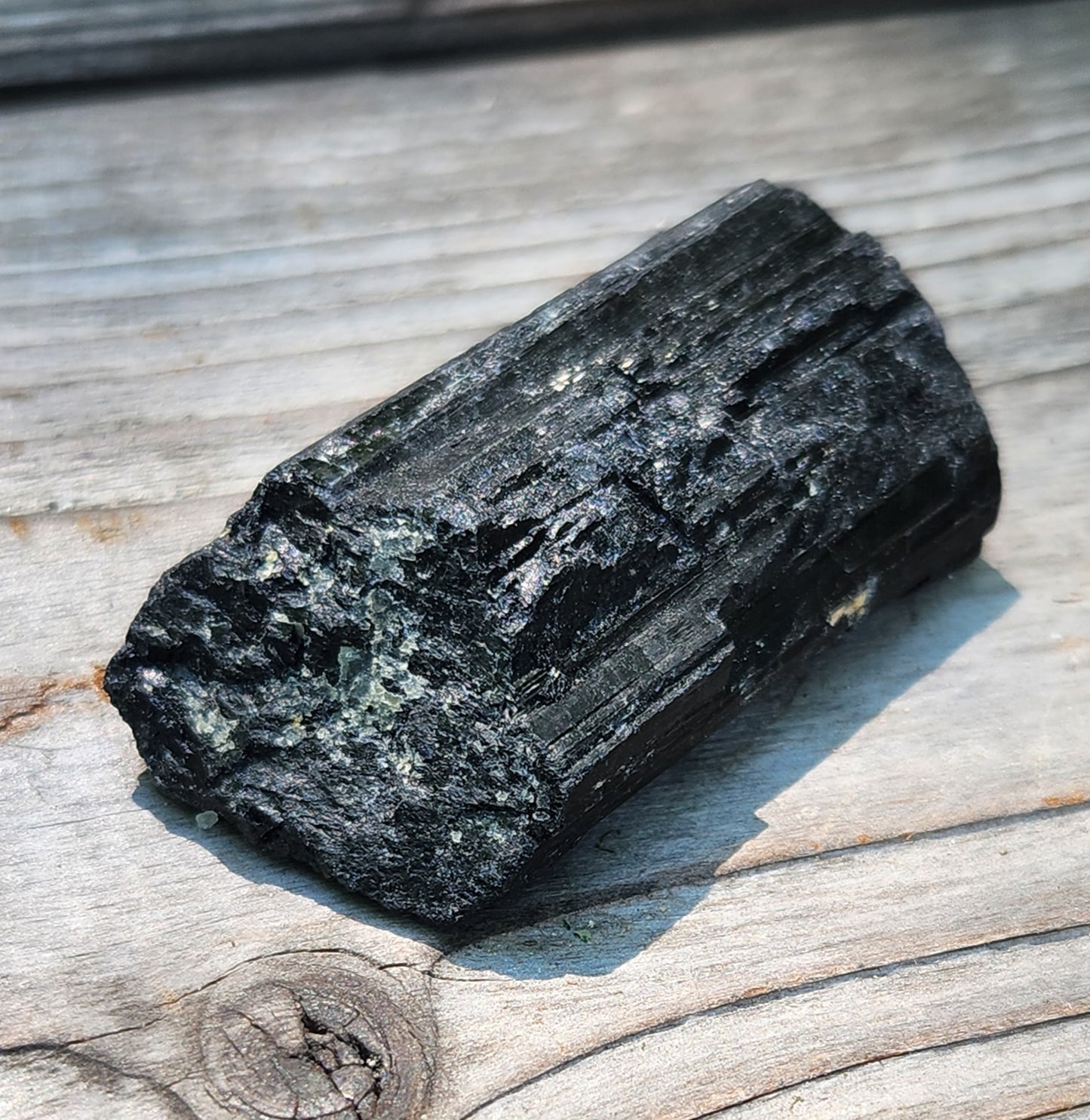 Natural schorl tourmaline specimen showing classic columnar crystal form, item RC423