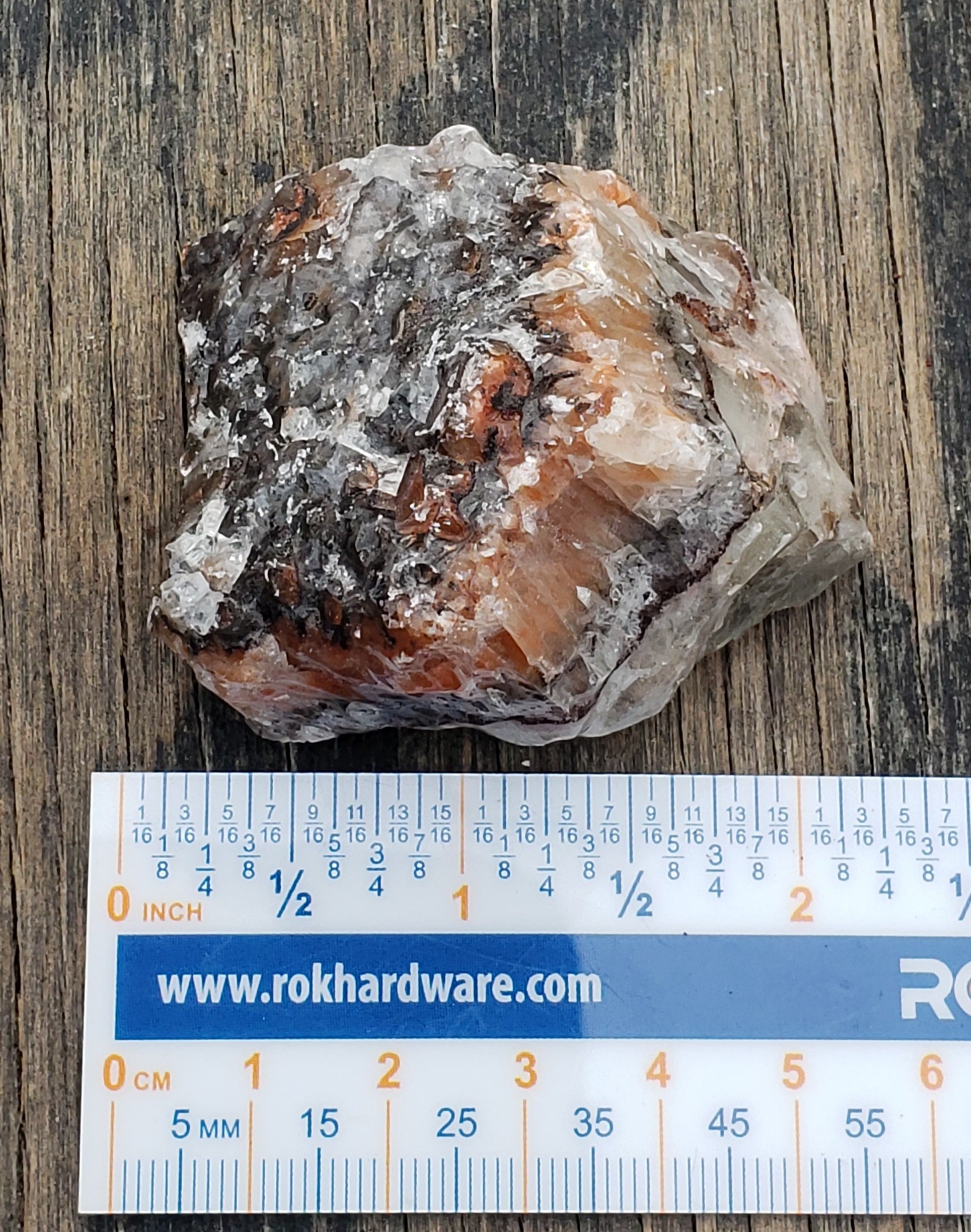 Natural tri-color calcite rough rock display piece with ruler